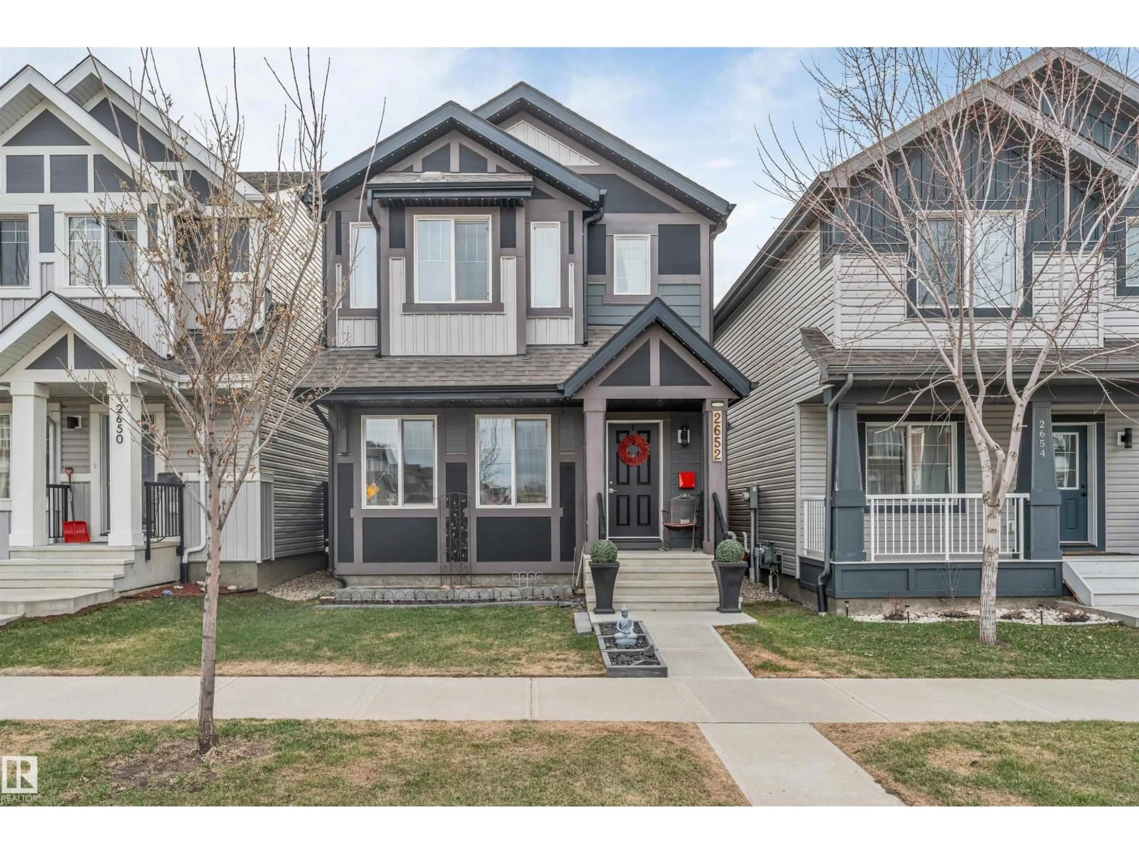 Home with vinyl exterior material, street for 2652 MAPLE WAY, Edmonton Alberta T6T2G3