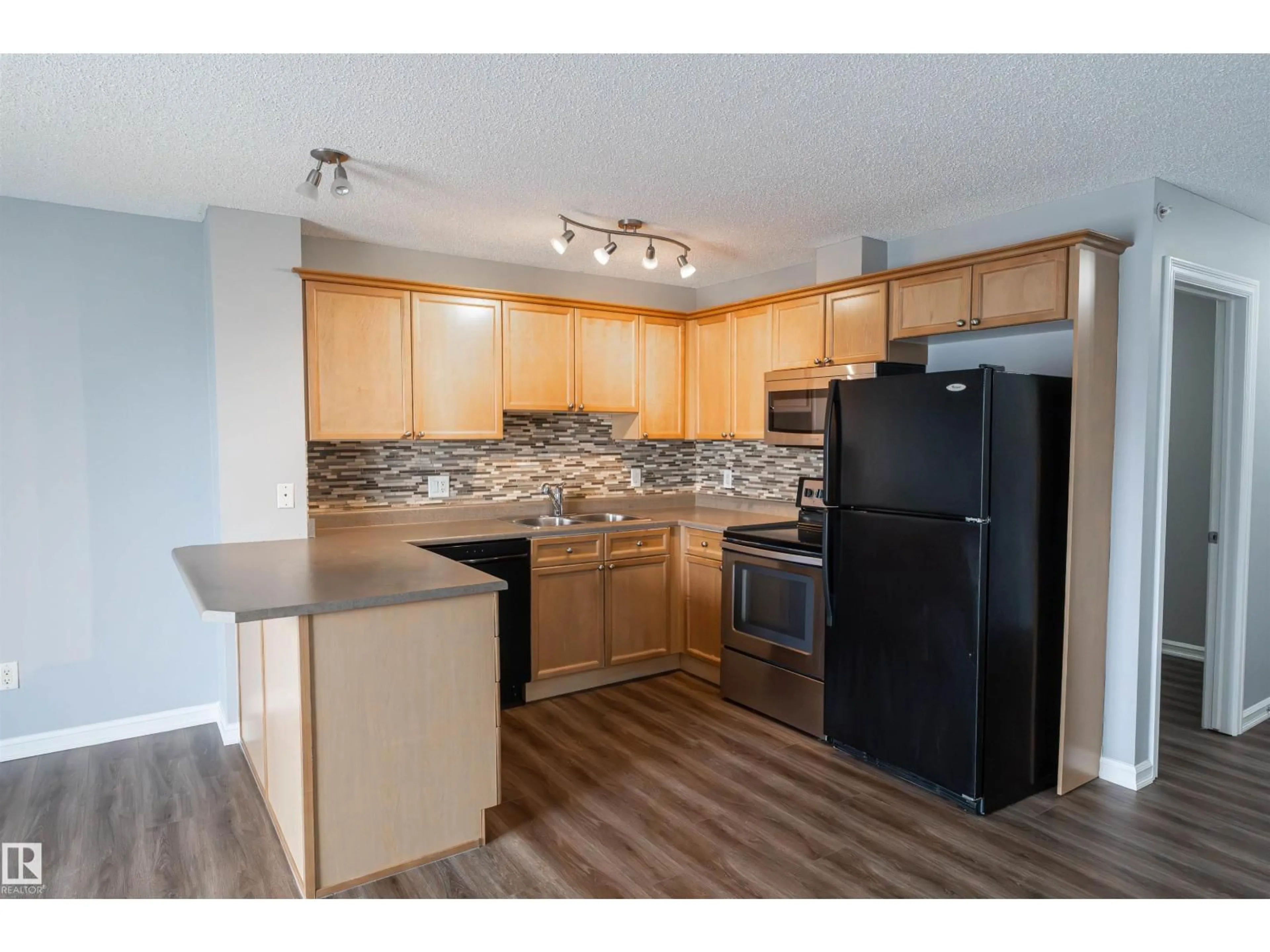 Standard kitchen, wood/laminate floor for 4407 23 ST, Edmonton Alberta T6T0B6