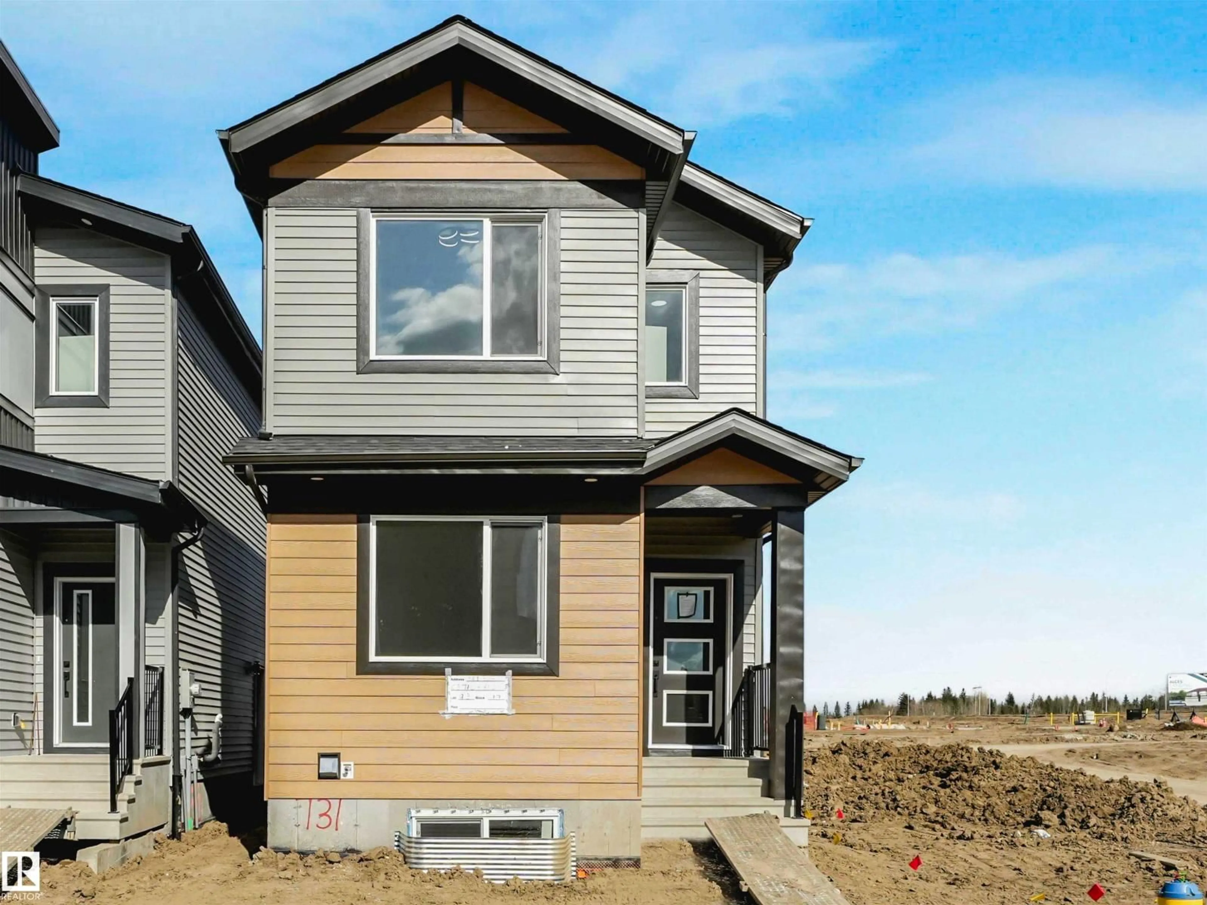 Home with vinyl exterior material, street for 731 30 ST, Edmonton Alberta T6X3M3