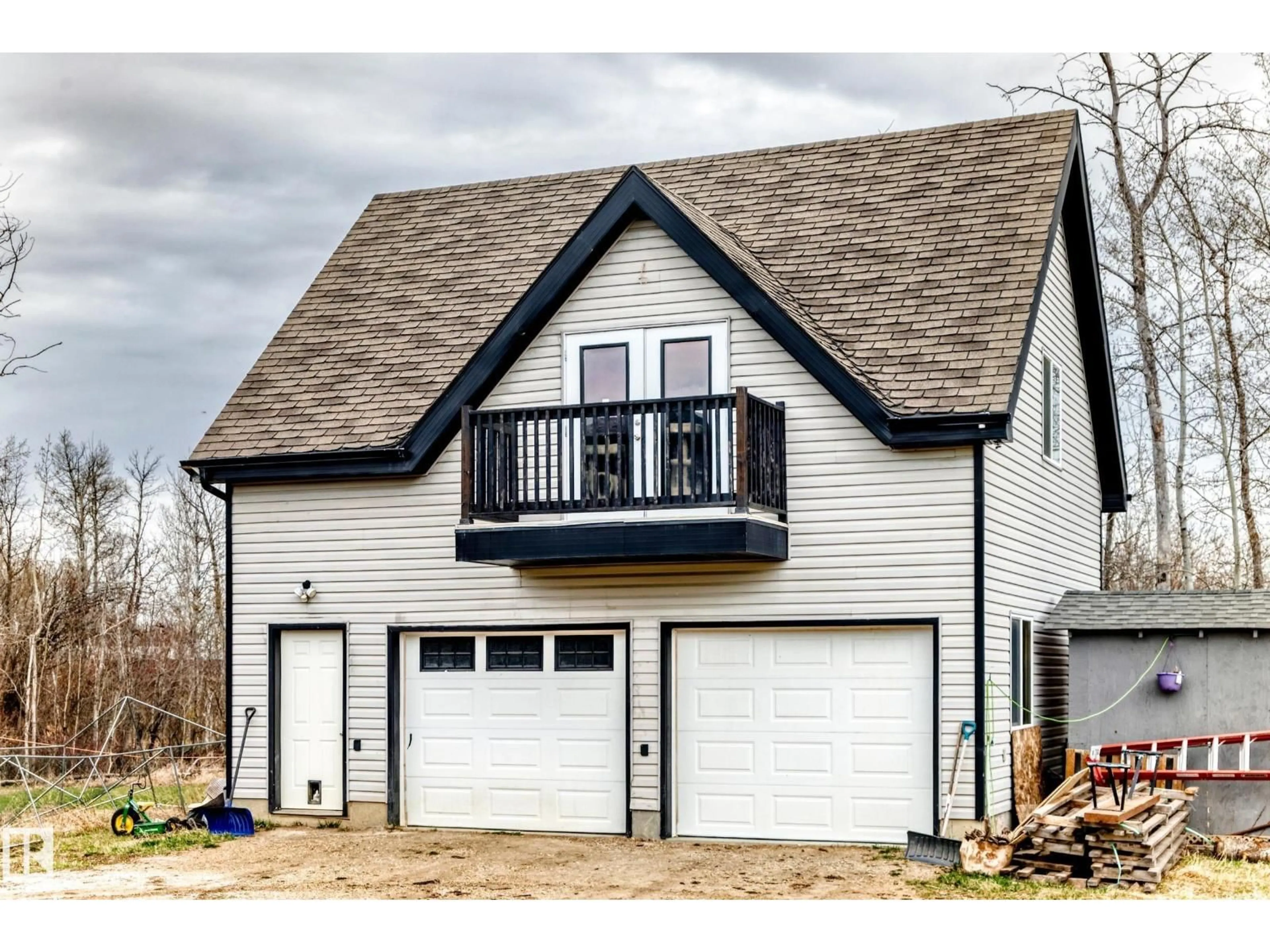 Home with vinyl exterior material, street for 50542 RGE RD 224, Rural Leduc County Alberta T0B3M1