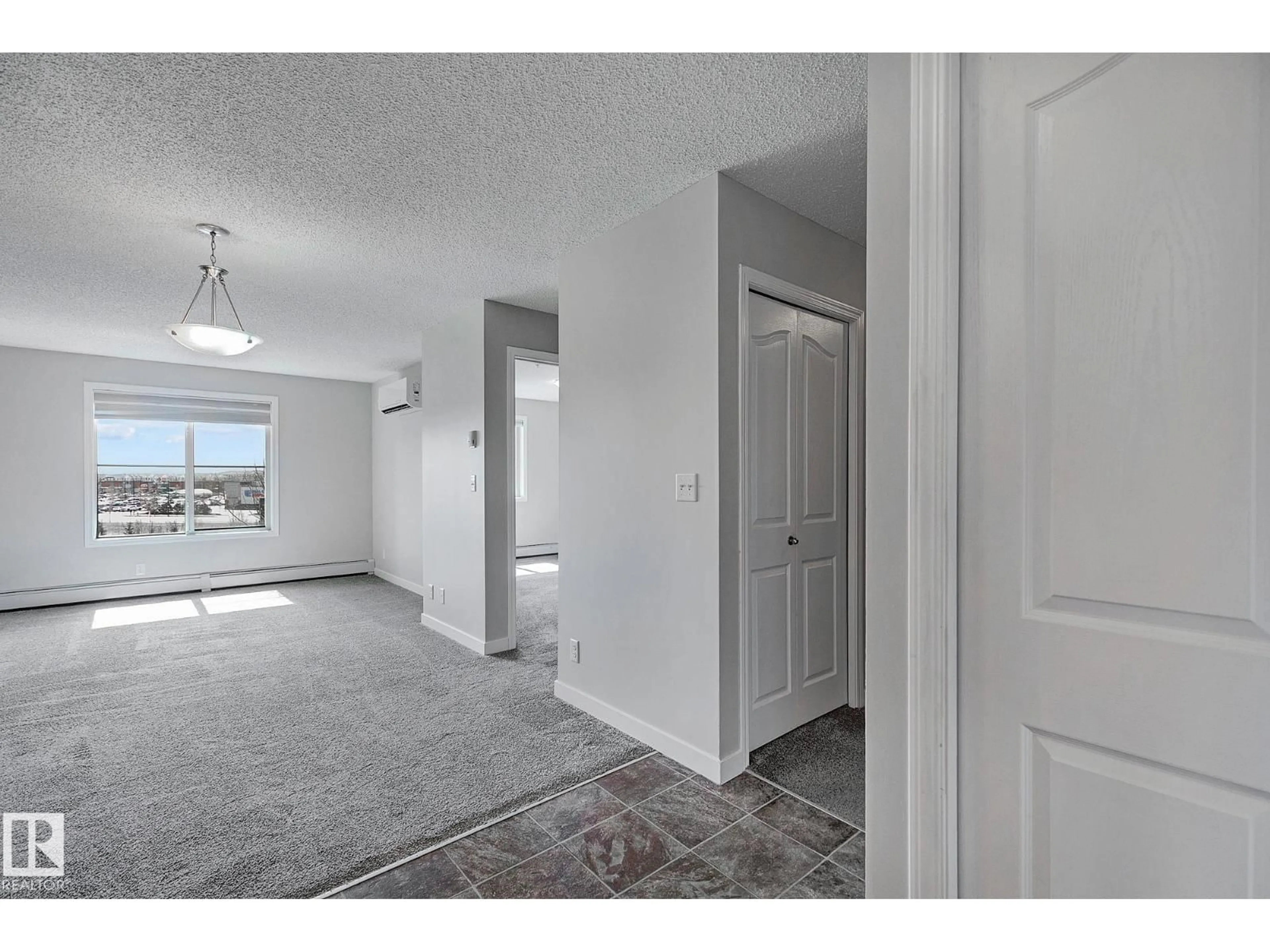 Indoor entryway for #306 - 12035 22 AV, Edmonton Alberta T6W2X9