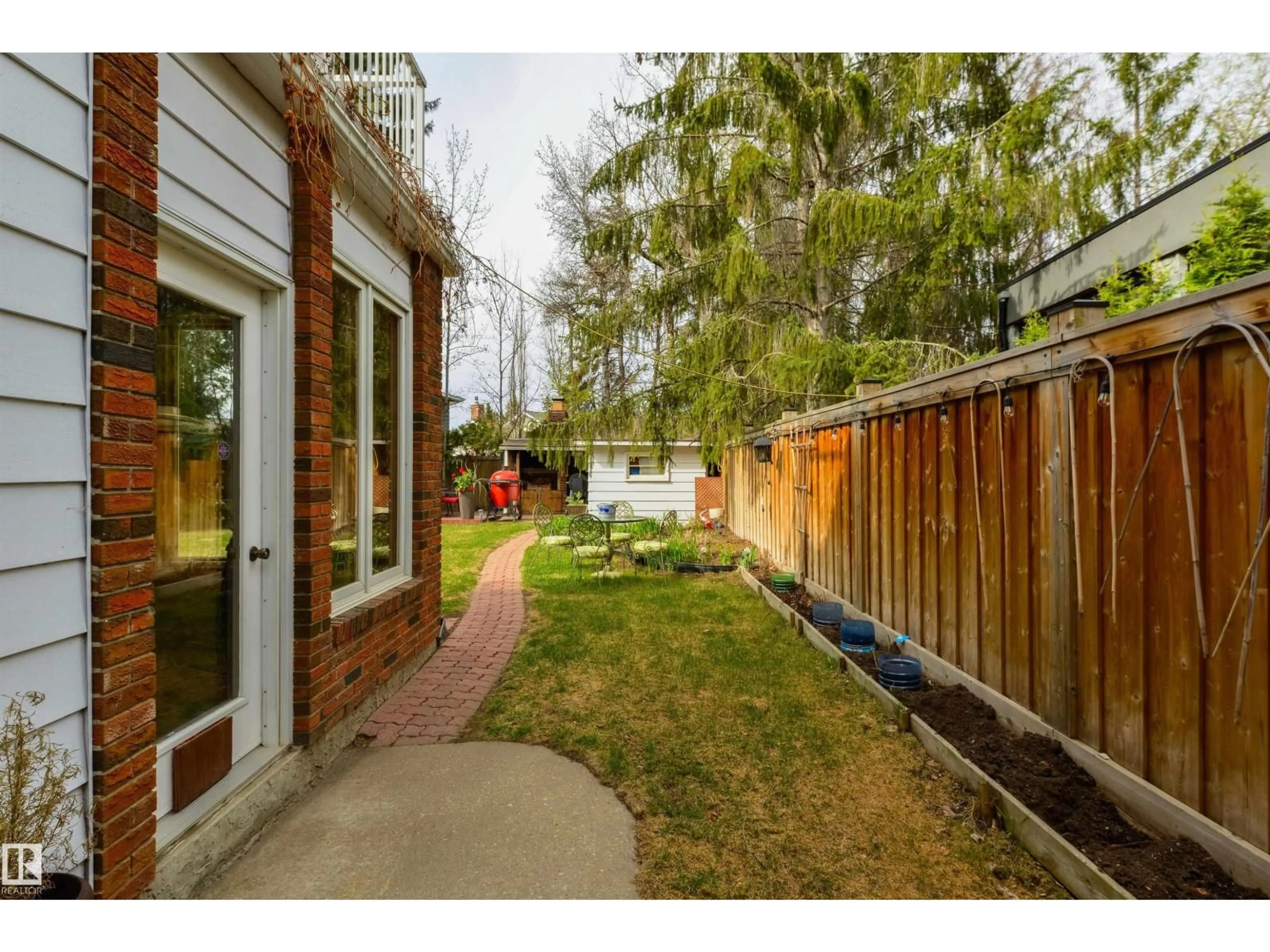 Patio, forest/trees view for 206 WOLF WILLOW CR, Edmonton Alberta T5T1T2