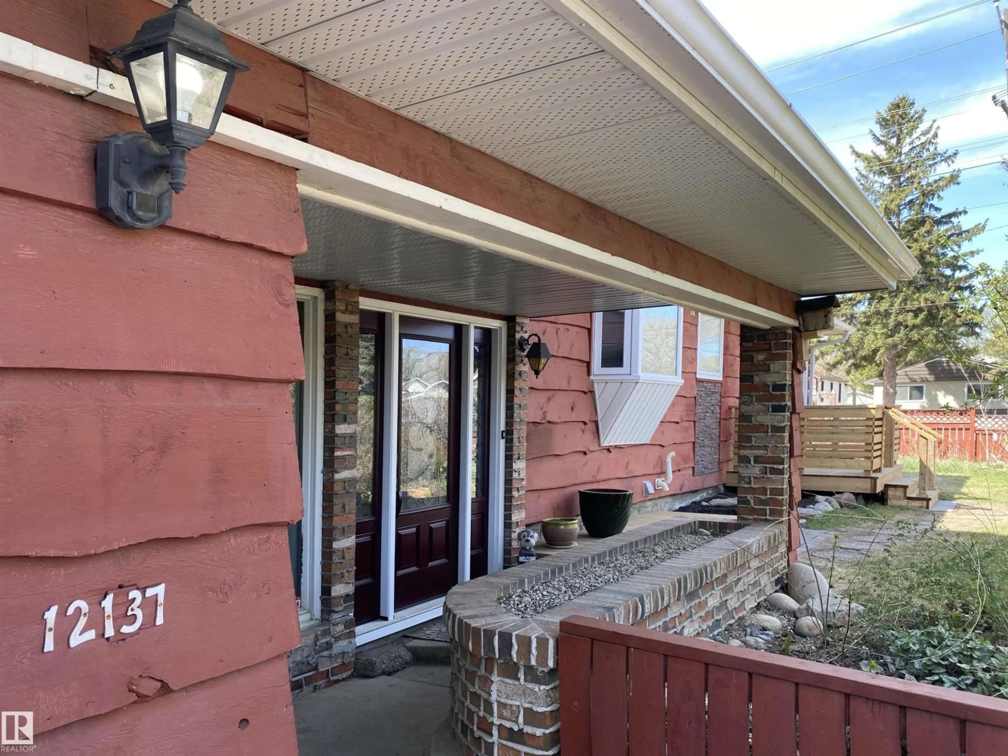 Home with brick exterior material, street for 12137 50 ST NW, Edmonton Alberta T5W3C6