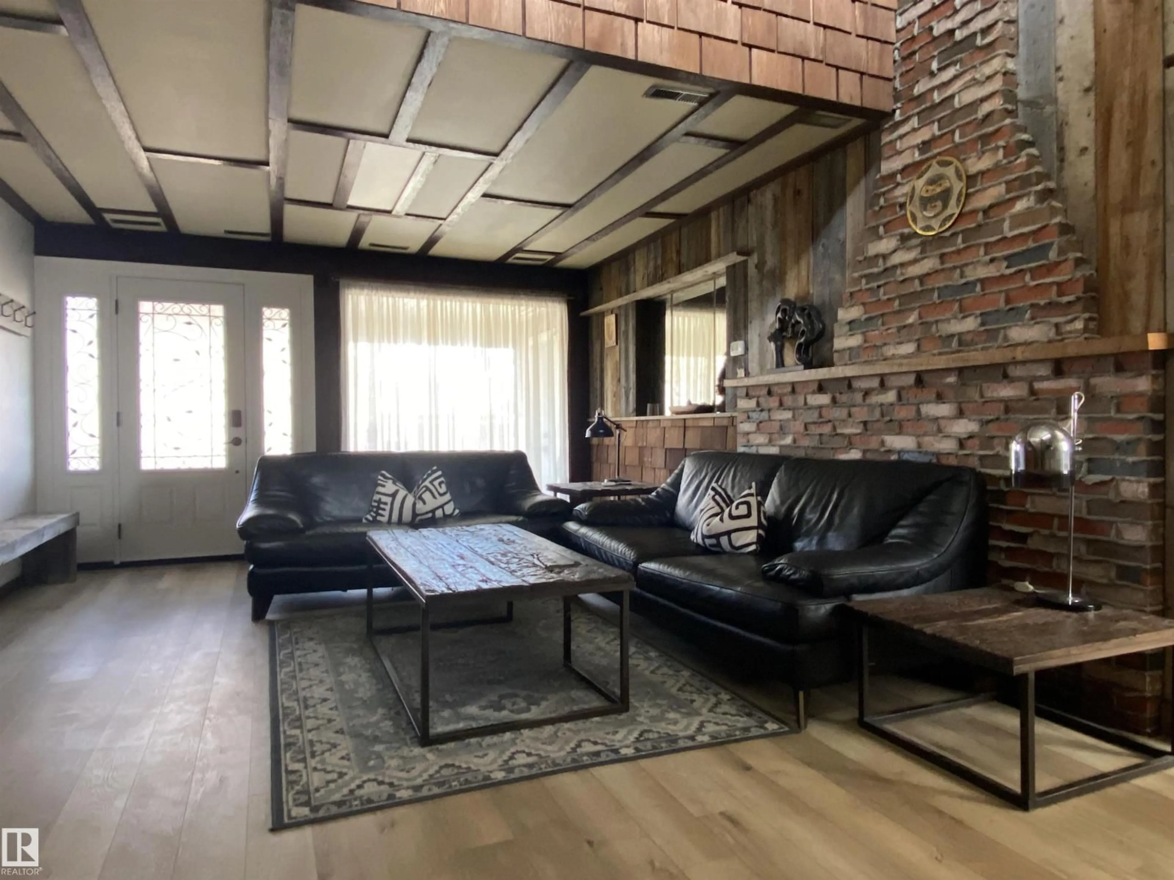 Living room with furniture, unknown for 12137 50 ST NW, Edmonton Alberta T5W3C6