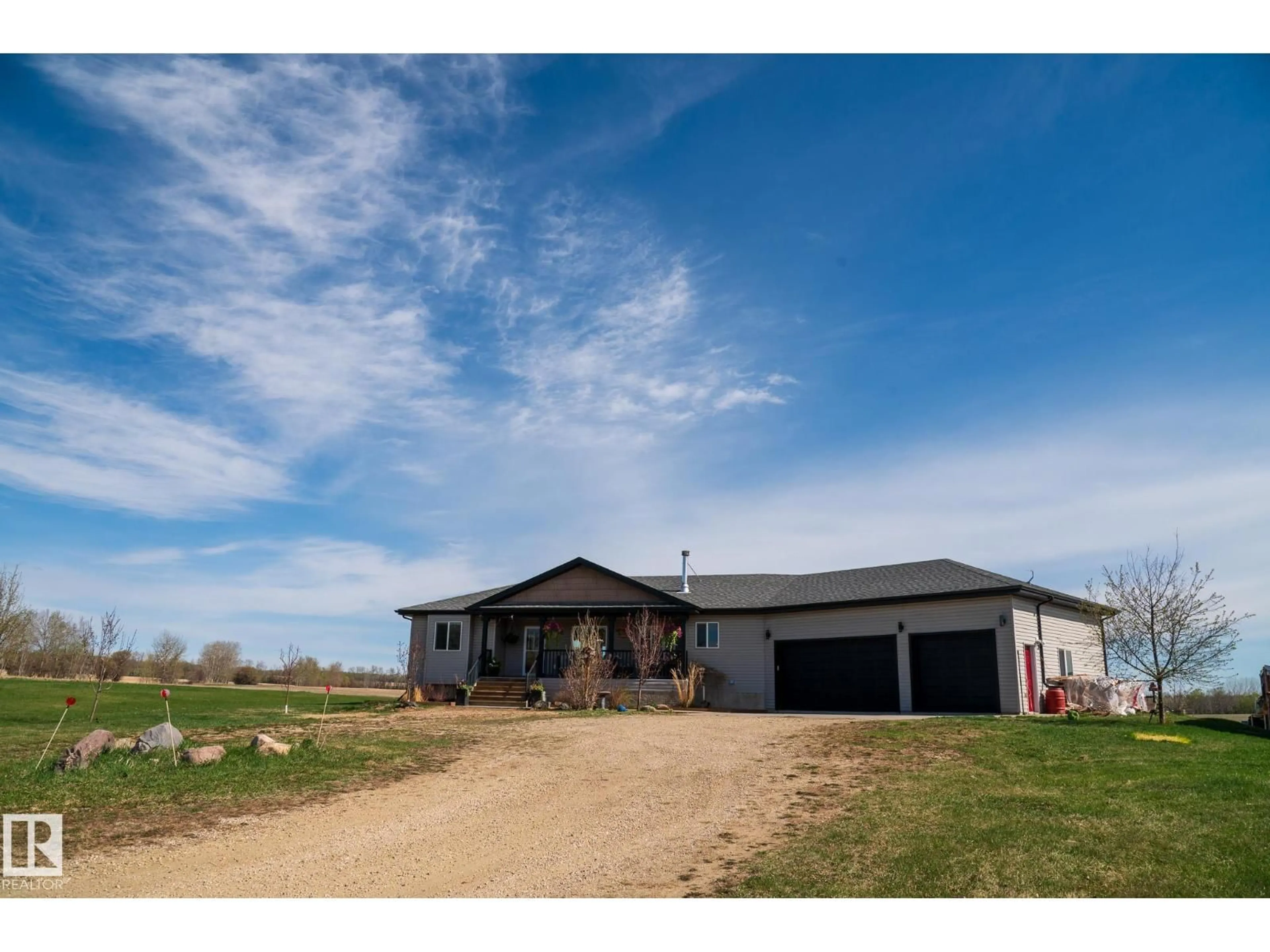 A pic from outside/outdoor area/front of a property/back of a property/a pic from drone, unknown for 2208 TWP ROAD 534, Rural Lac Ste. Anne County Alberta T0E1V0