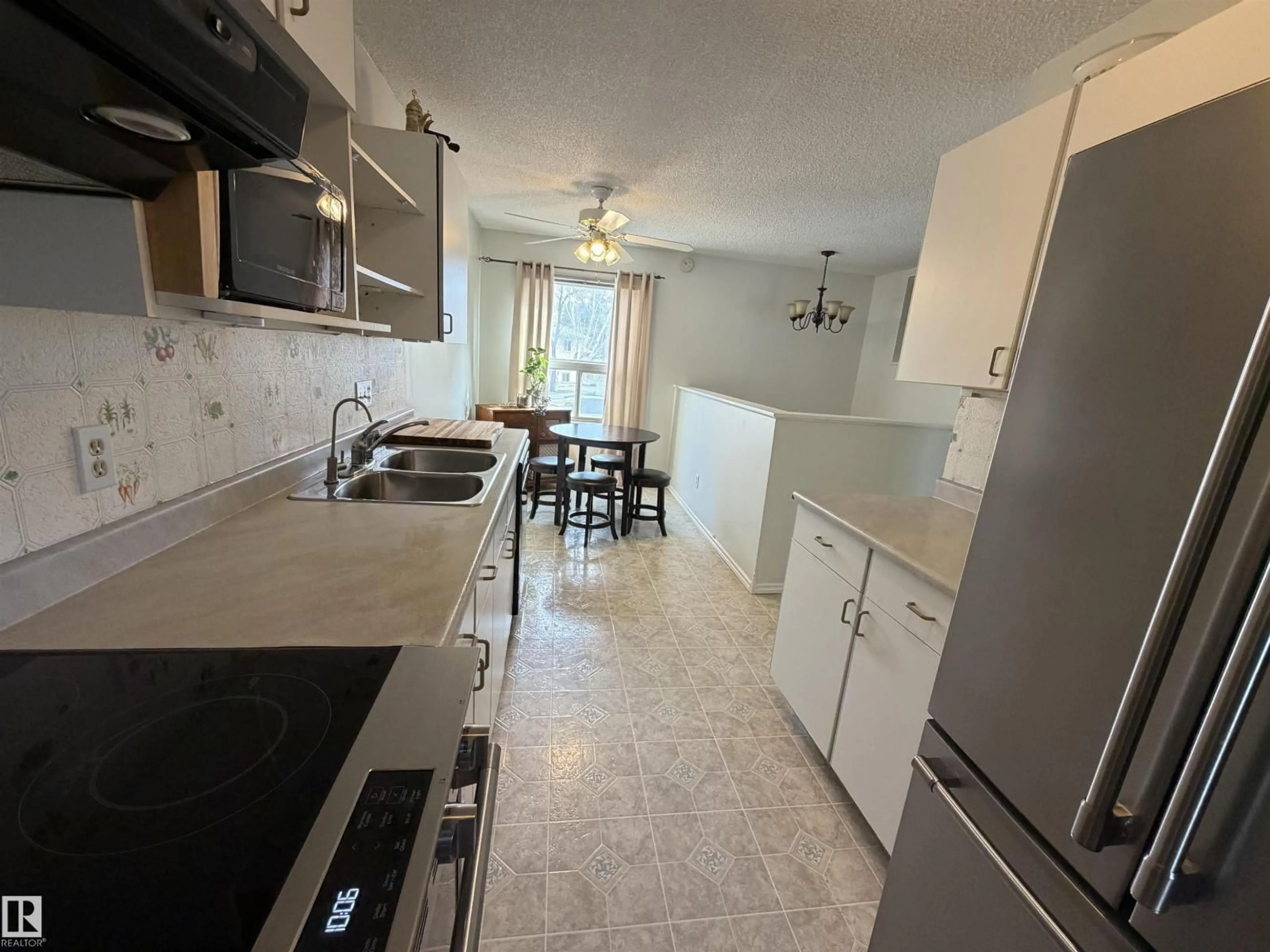Standard kitchen, ceramic/tile floor for 1875 MILL WOODS RD E, Edmonton Alberta T6L6K2