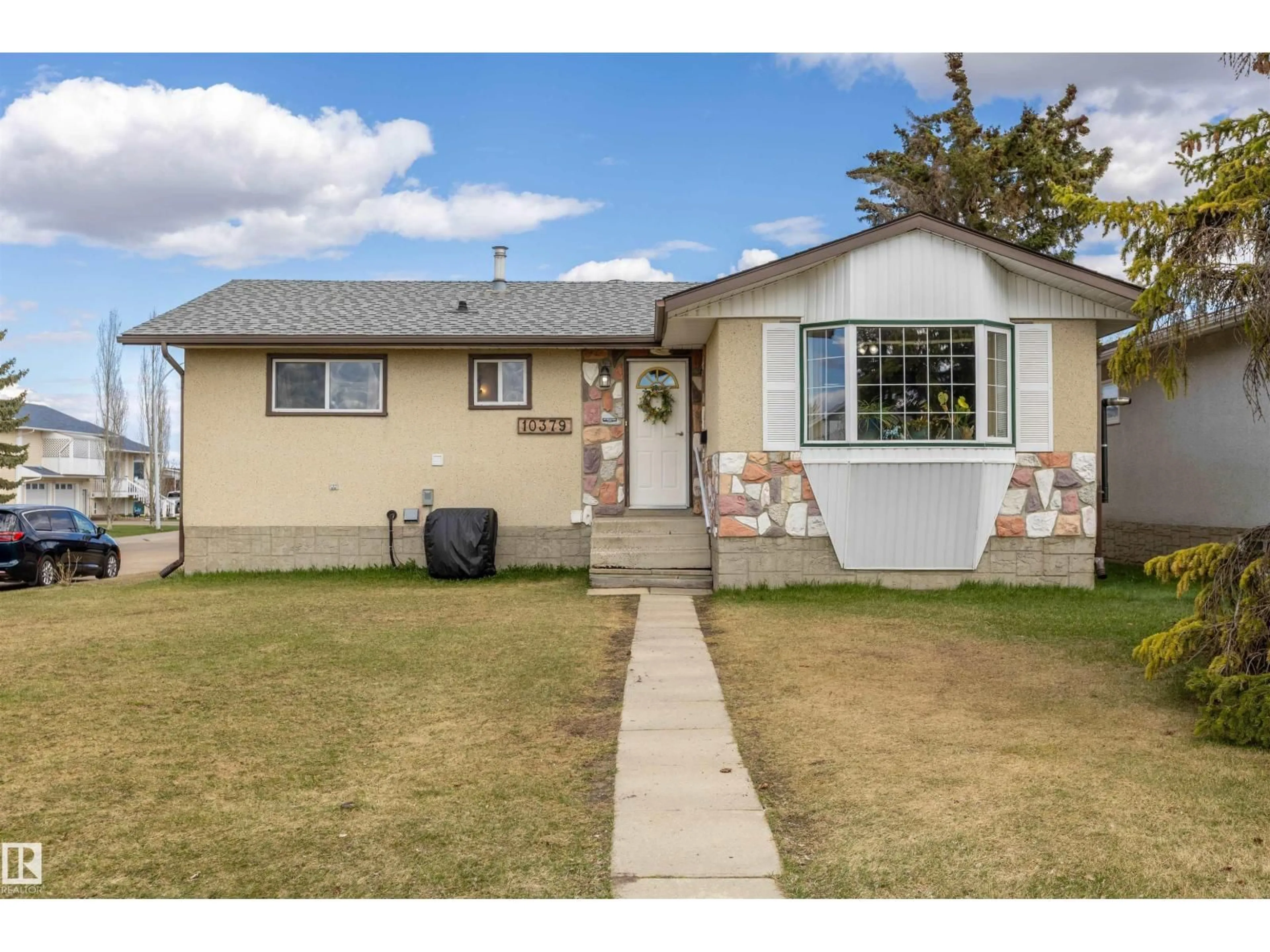 Home with vinyl exterior material, street for 10379 108 AV, Westlock Alberta T7P1J2