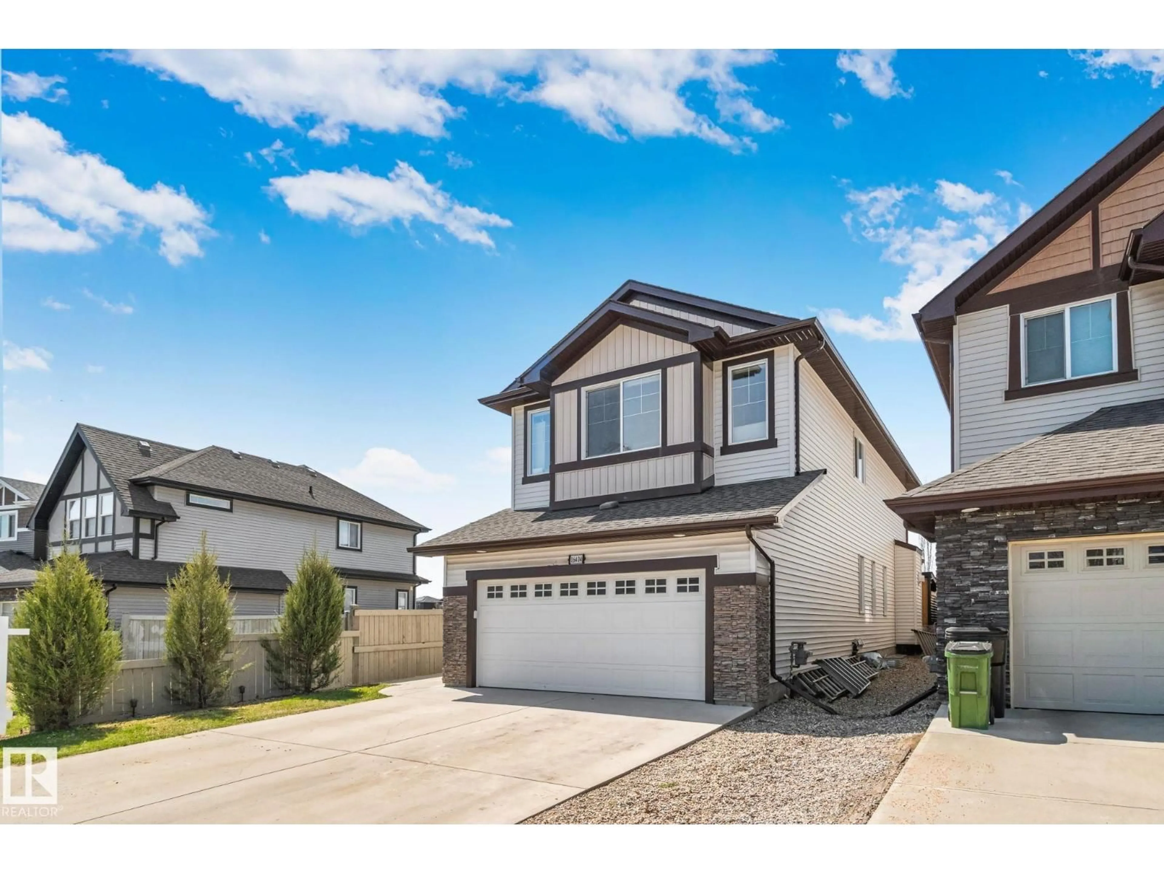 Home with vinyl exterior material, street for NW - 16404 136 ST, Edmonton Alberta T6V0K1