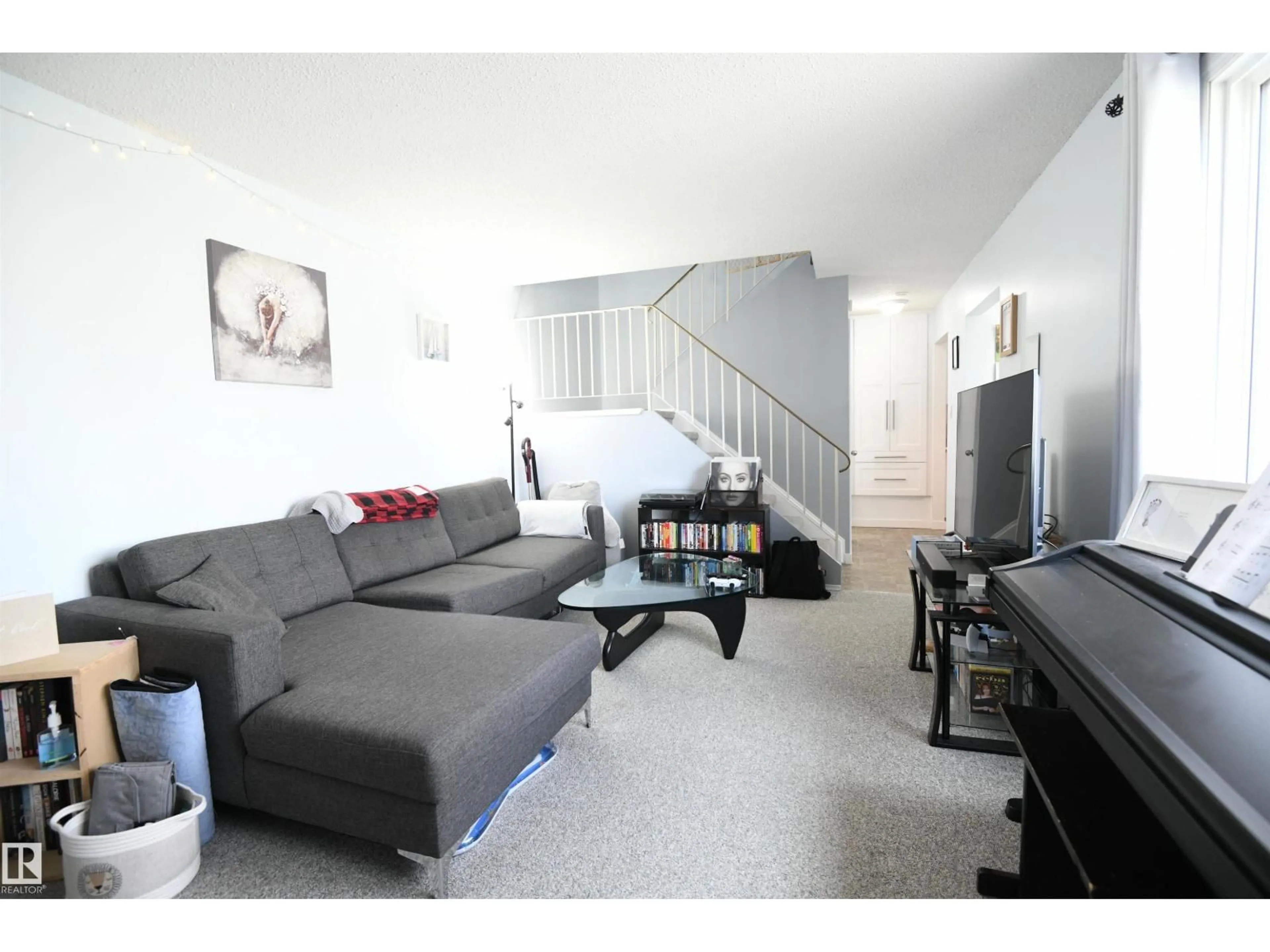 Living room with furniture, unknown for 5823 RIVERBEND RD, Edmonton Alberta T6H5A8