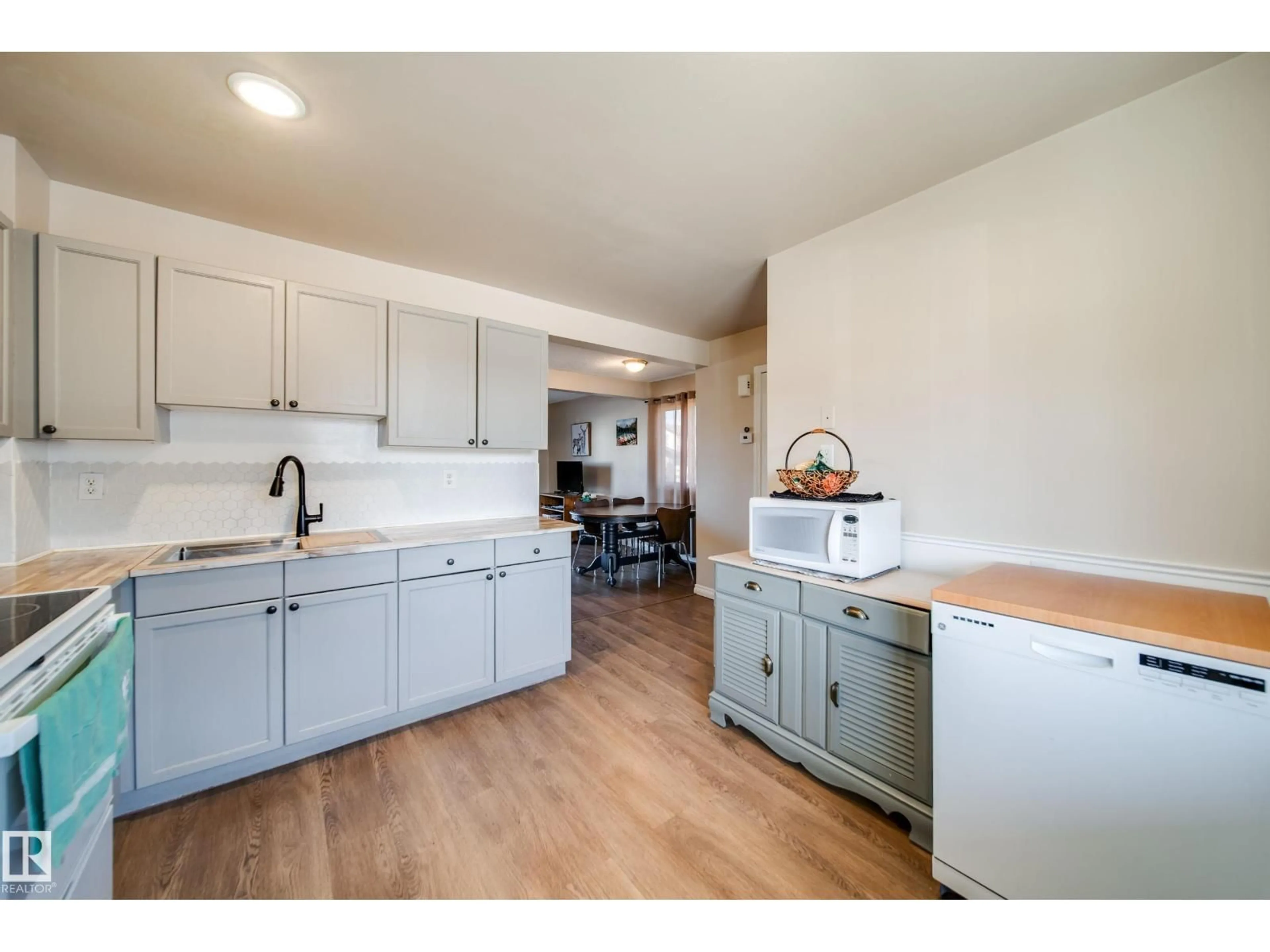 Open concept kitchen, unknown for #21 - 18010 98 AV, Edmonton Alberta T5T3H6