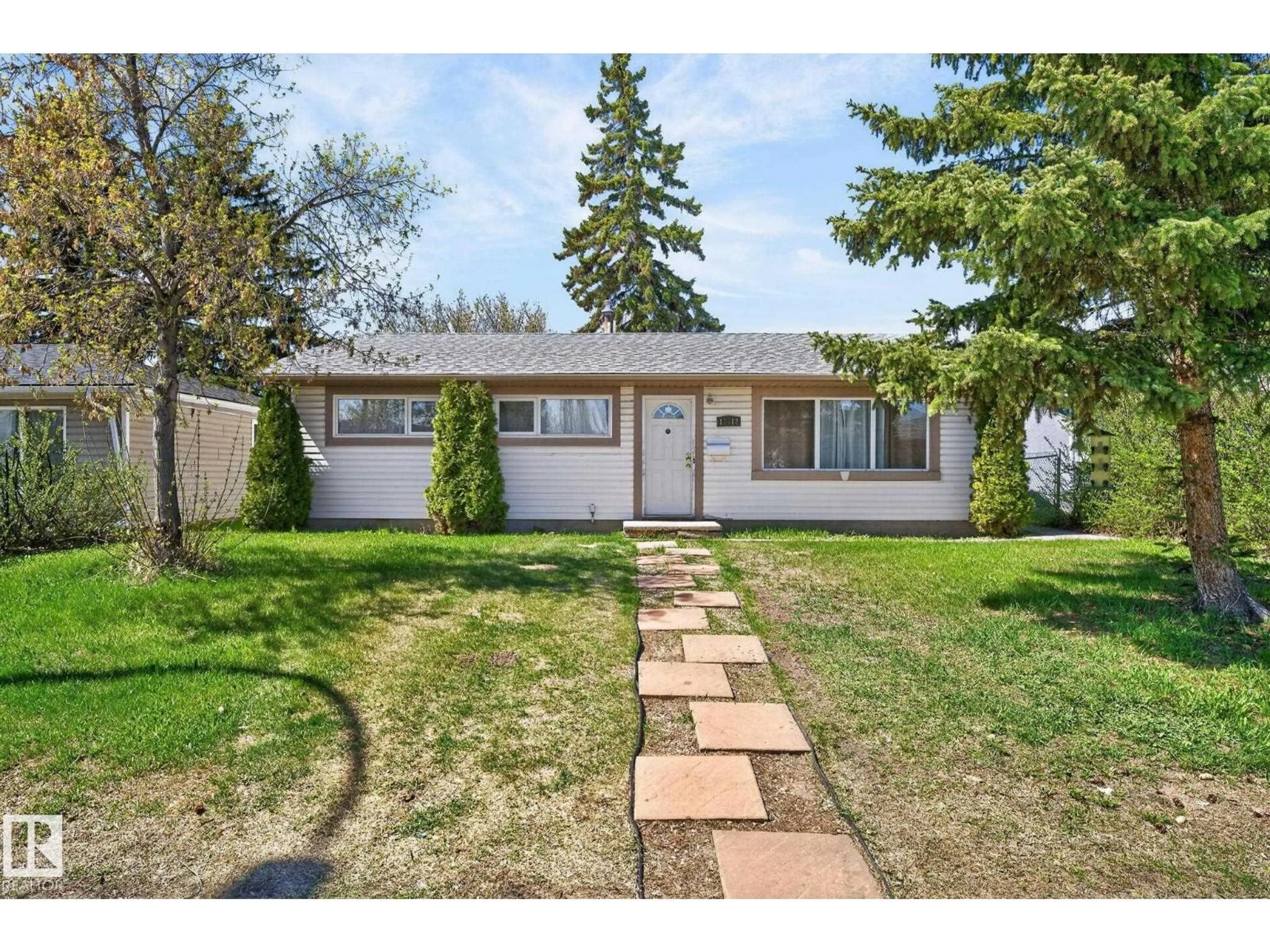 Home with vinyl exterior material, street for NW - 13412 108 ST, Edmonton Alberta T5E4X6