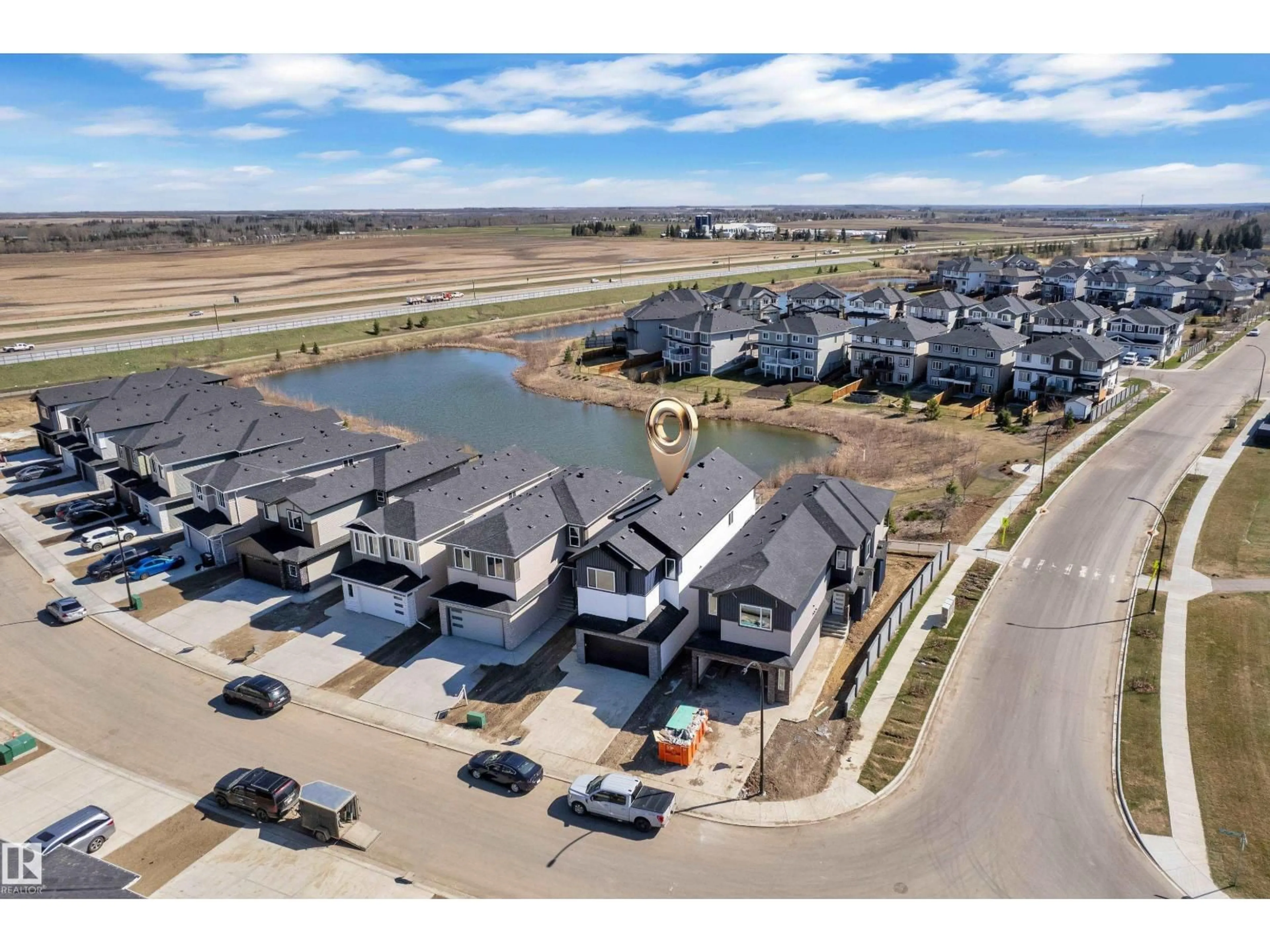 A pic from outside/outdoor area/front of a property/back of a property/a pic from drone, water/lake/river/ocean view for 3 AXELWOOD CR, Spruce Grove Alberta T7X4G4