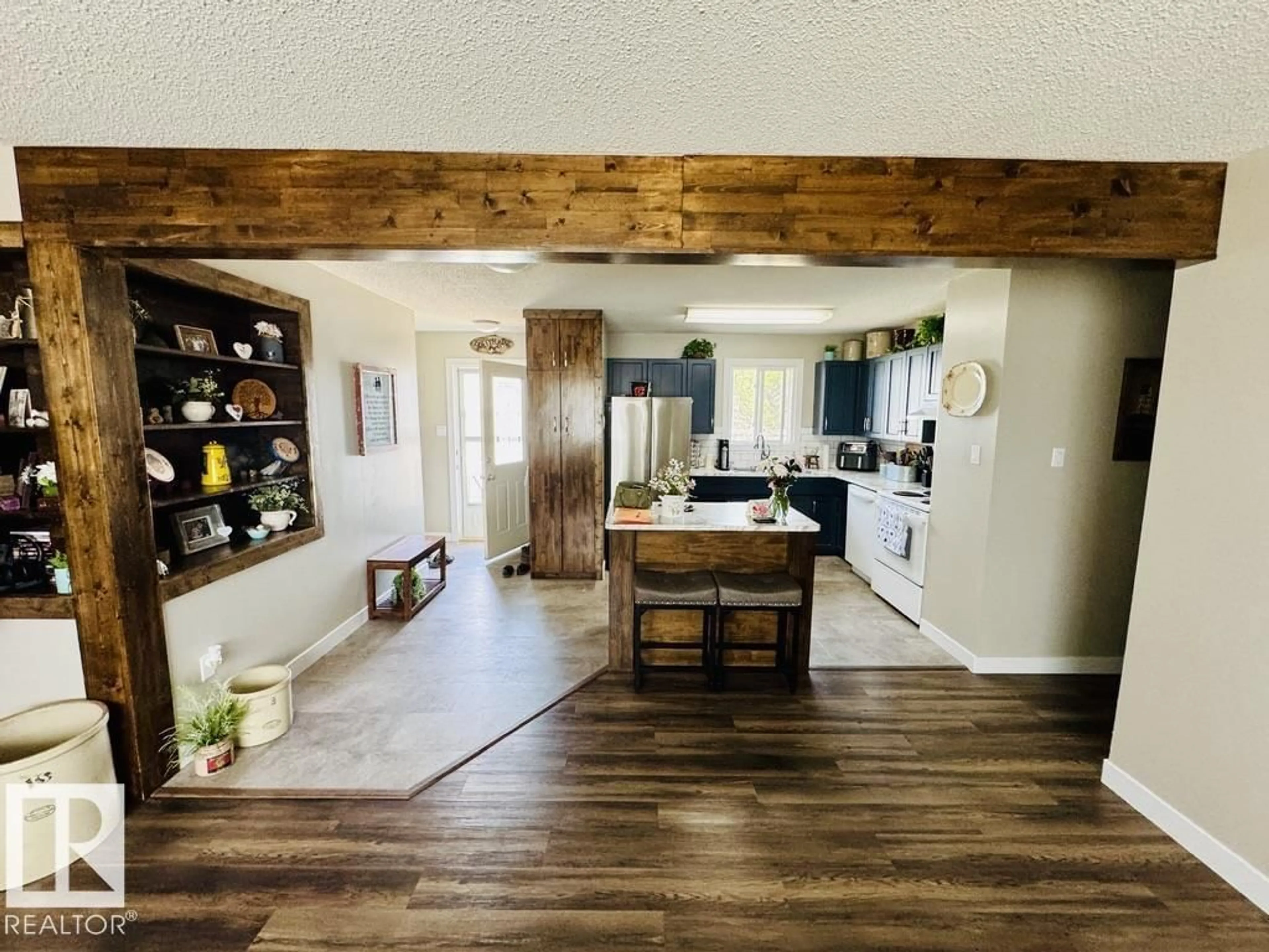 Open concept kitchen, wood/laminate floor for 4318 49 AV, St. Paul Town Alberta T0A3A3