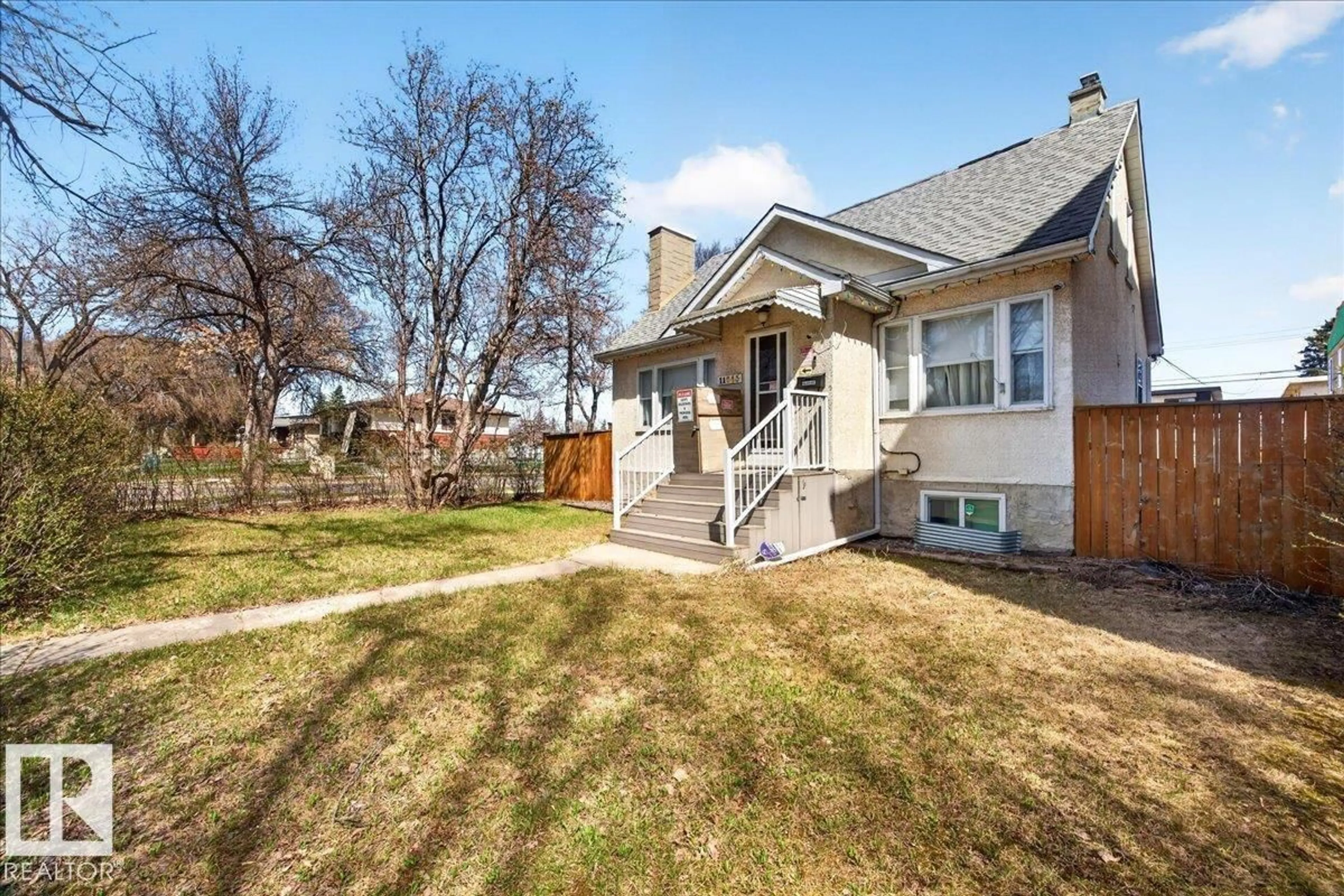 A pic from outside/outdoor area/front of a property/back of a property/a pic from drone, street for 11645 125 ST, Edmonton Alberta T5M0N5