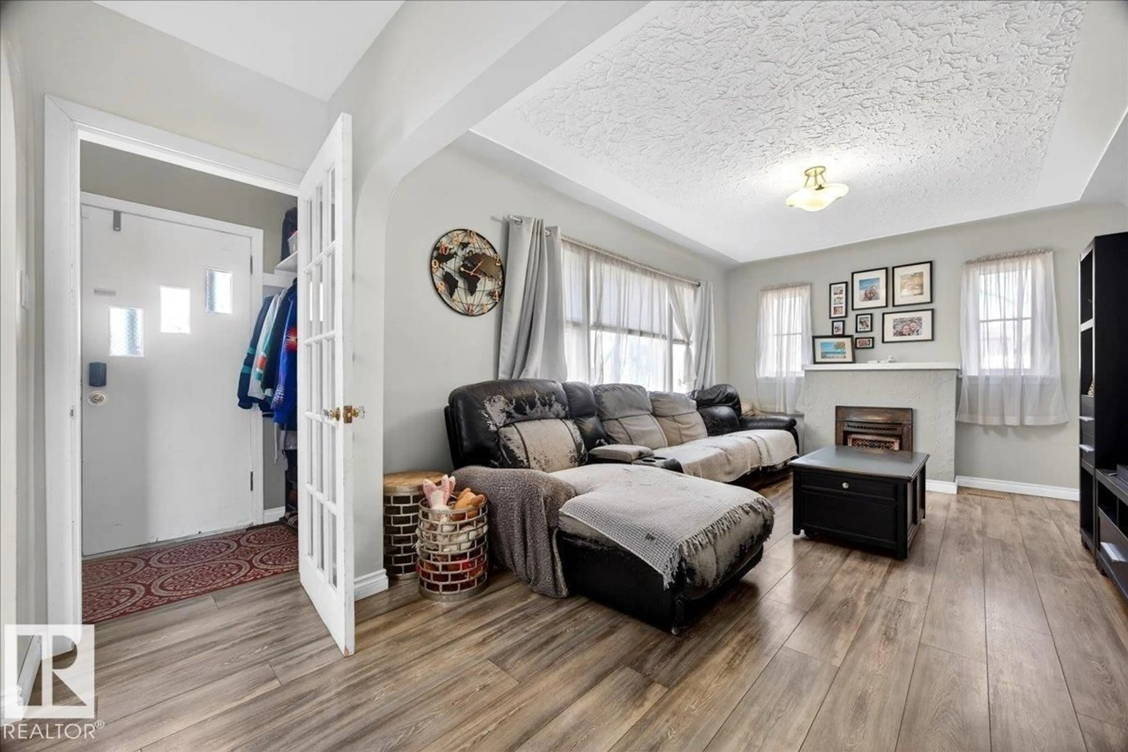 Living room with furniture, unknown for 11645 125 ST, Edmonton Alberta T5M0N5