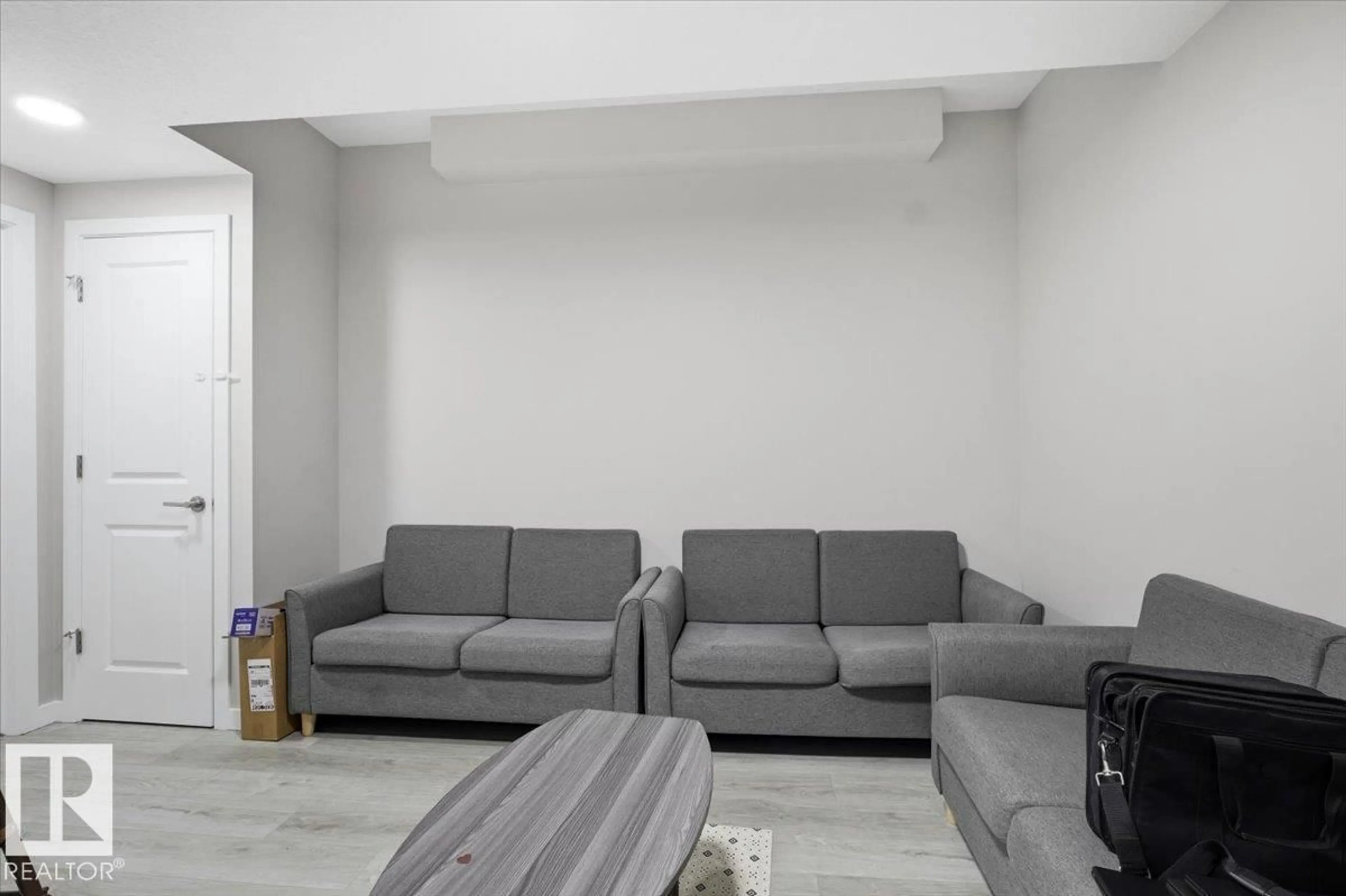 Living room with furniture, unknown for NW - 7056 182 AVENUE, Edmonton Alberta T5Z0V7