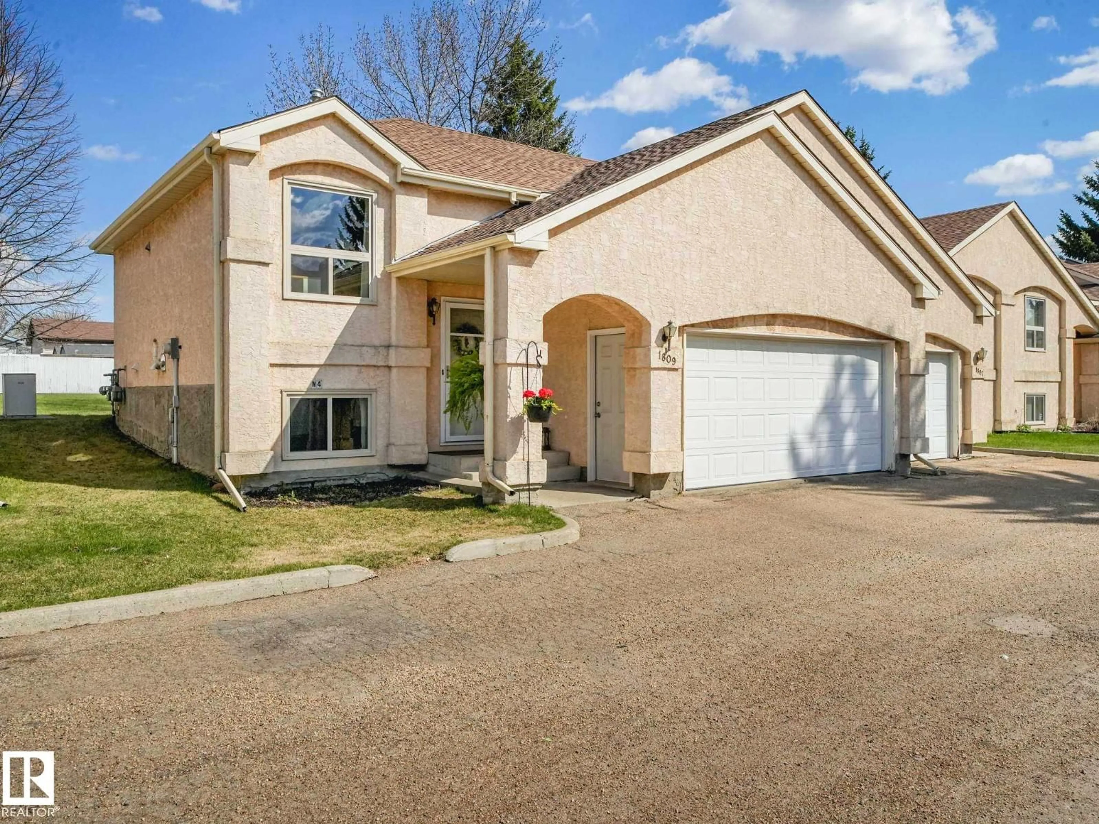 Home with vinyl exterior material, street for NW - 1809 MILL WOODS RD E, Edmonton Alberta T6L6K2
