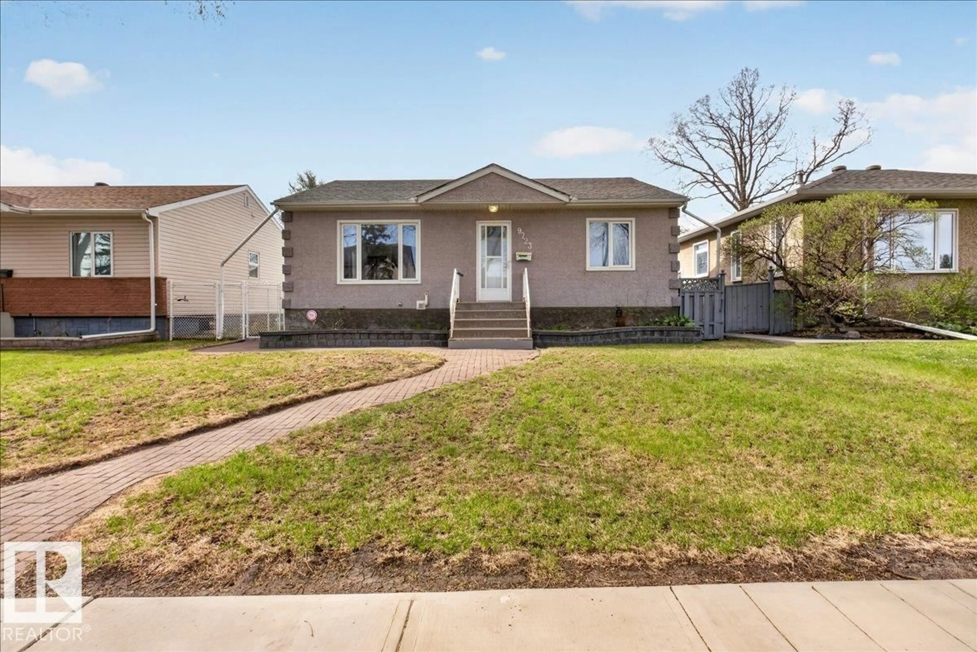 Home with vinyl exterior material, street for 9723 65 AV, Edmonton Alberta T6E0M4
