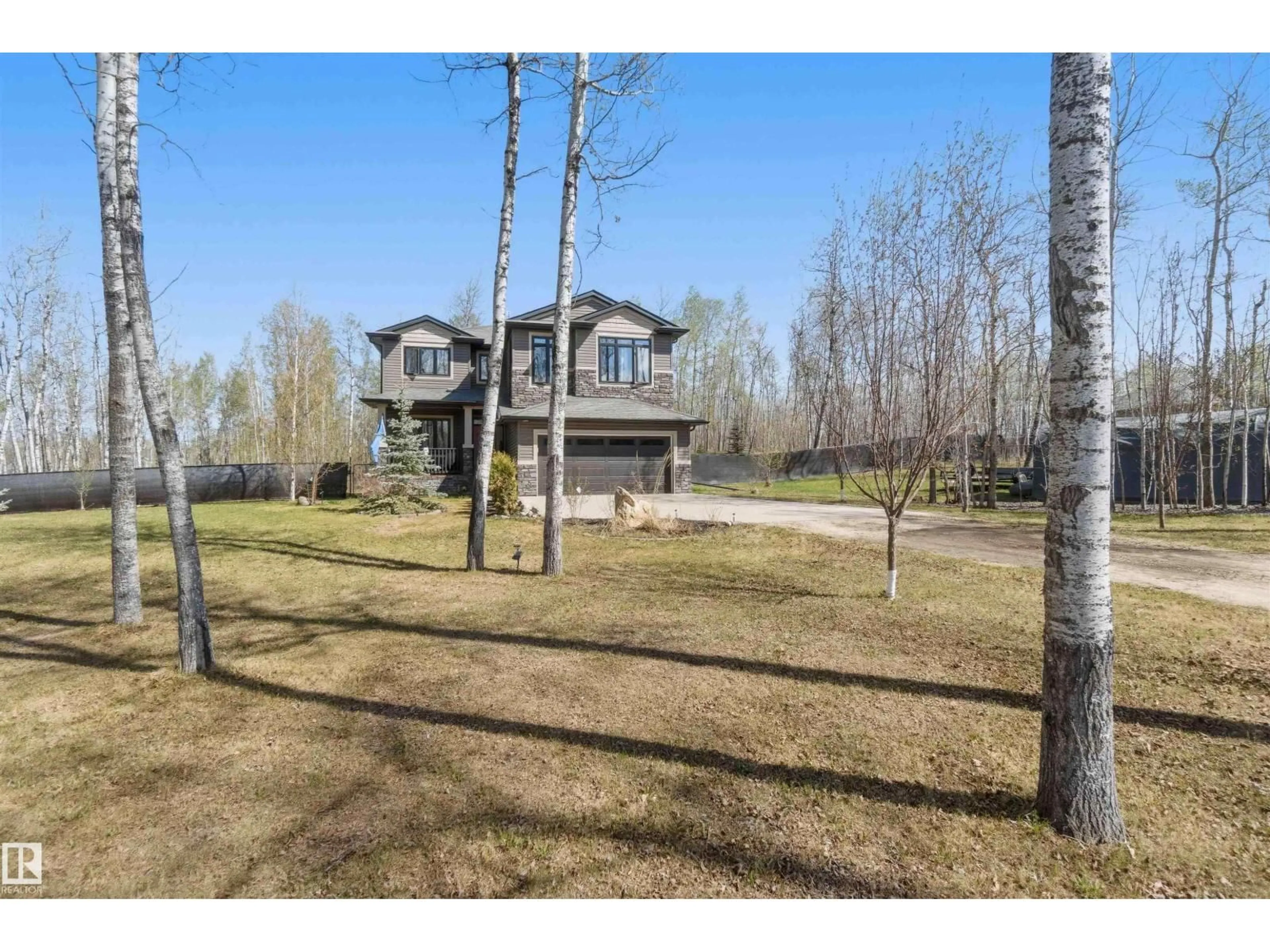 A pic from outside/outdoor area/front of a property/back of a property/a pic from drone, unknown for #4 - 54406 RGE ROAD 15, Rural Lac Ste. Anne County Alberta T0E1V2