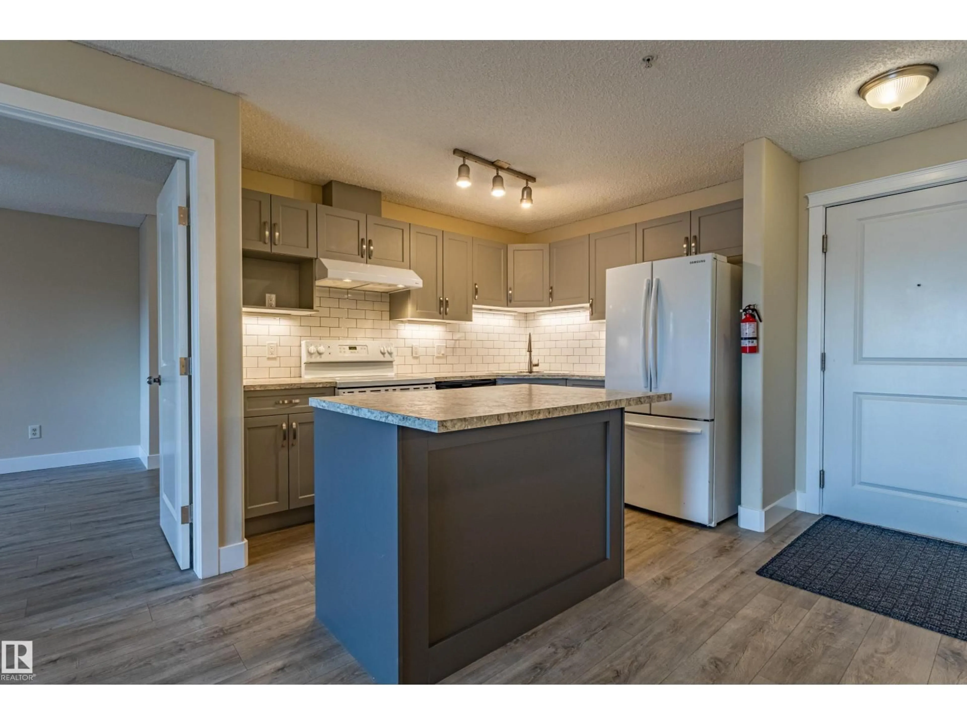 Standard kitchen, wood/laminate floor for #227 - 10535 122 ST, Edmonton Alberta T5N4B7