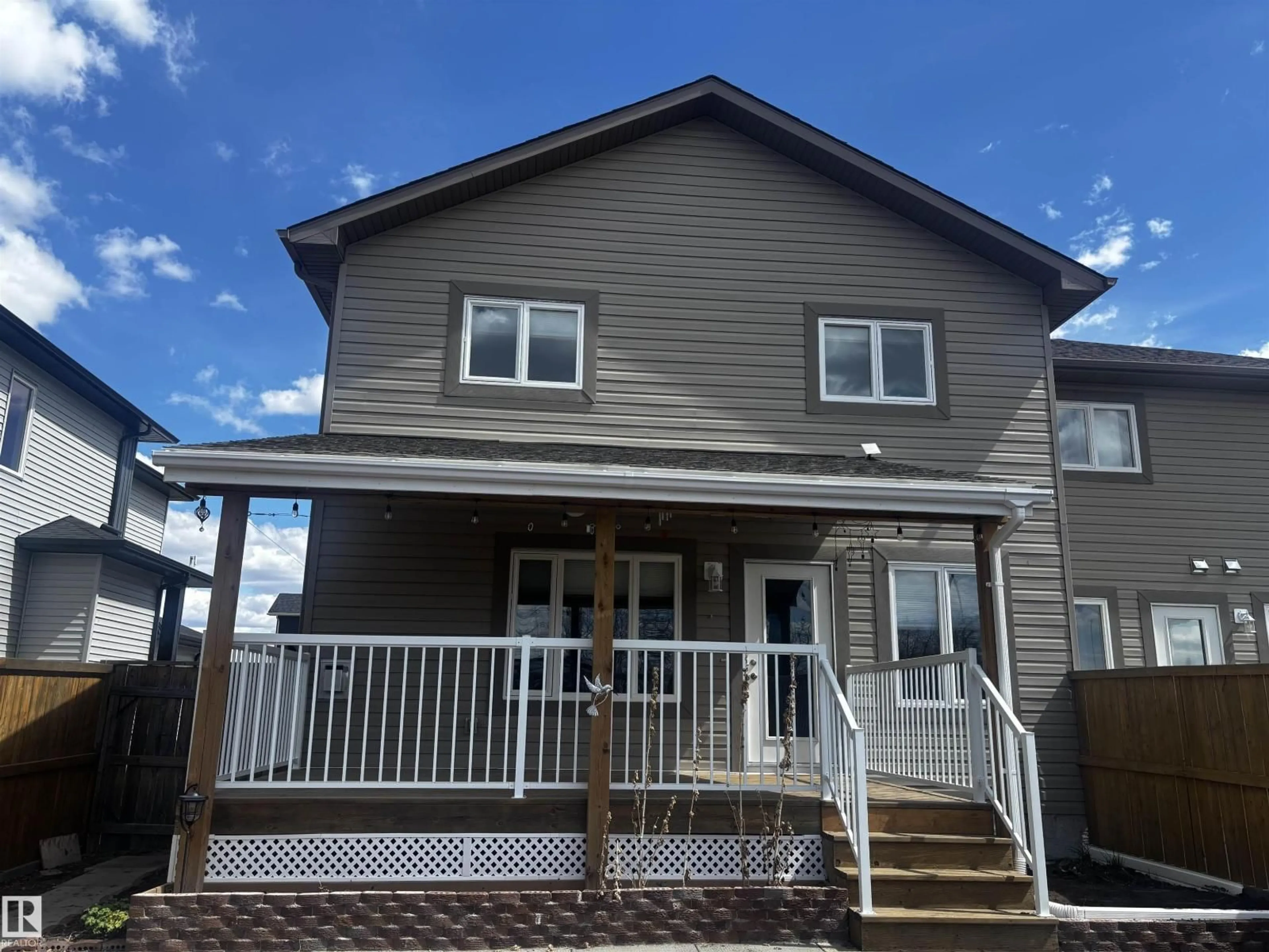 Home with vinyl exterior material, street for 4914 47 ST, Redwater Alberta T0A2W0