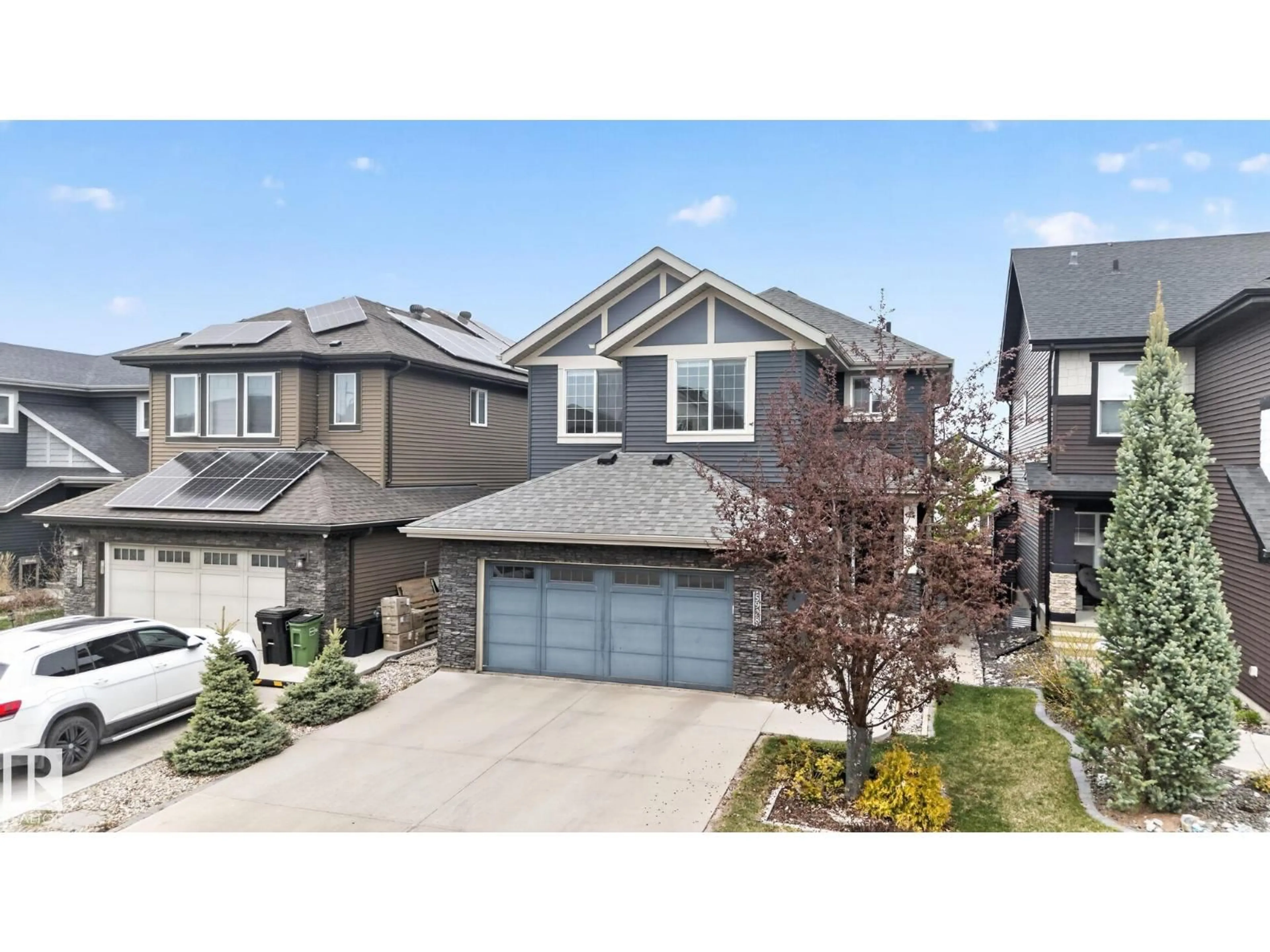 A pic from outside/outdoor area/front of a property/back of a property/a pic from drone, street for 5928 19 AV, Edmonton Alberta T6X2A2
