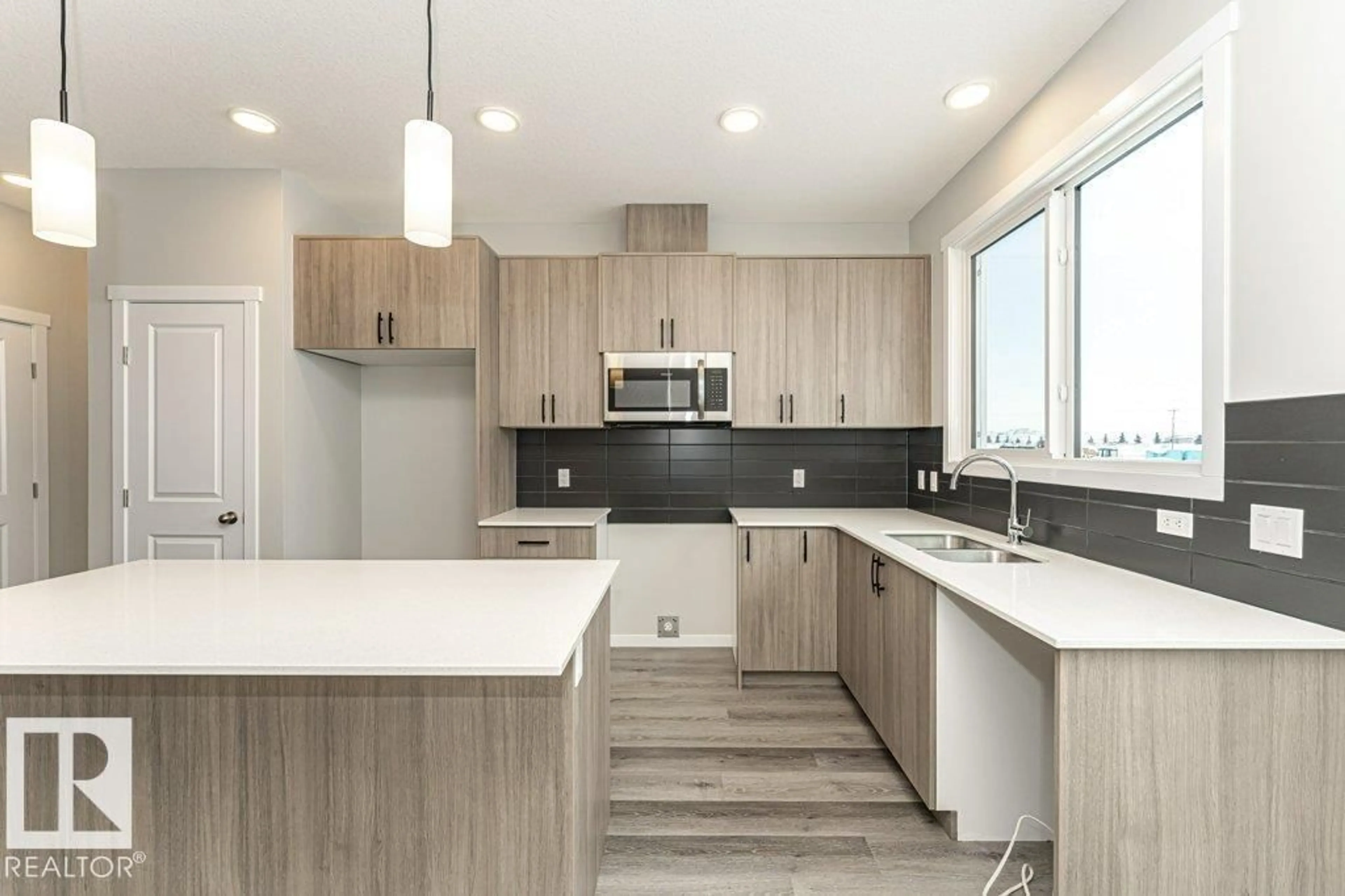 Open concept kitchen, unknown for 6415 63 ST, Beaumont Alberta T4X3E3