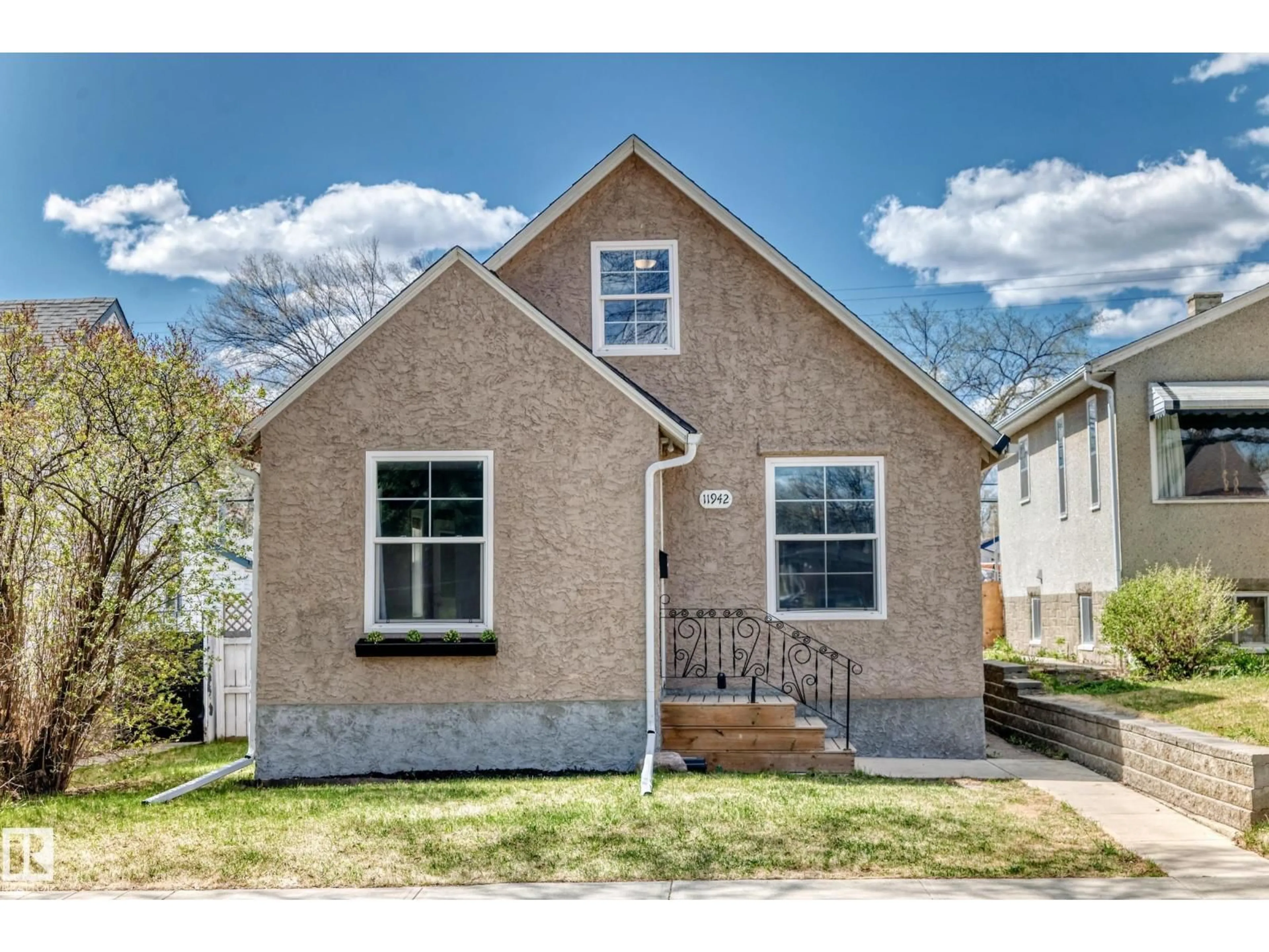 Home with vinyl exterior material, street for NW - 11942 62 ST, Edmonton Alberta T5W4C6