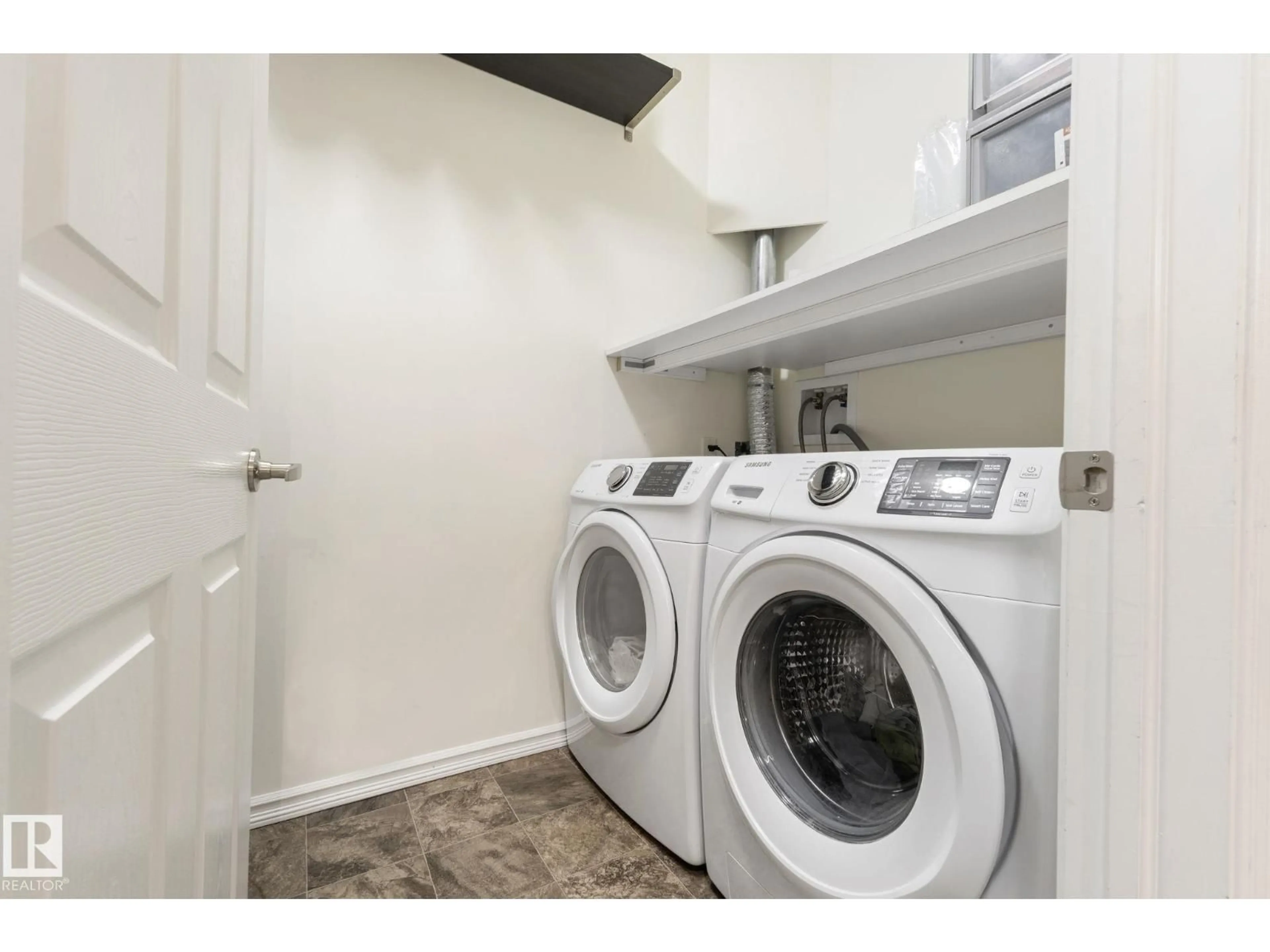 Laundry room for 237 - 263 MACEWAN RD, Edmonton Alberta T6W0C4