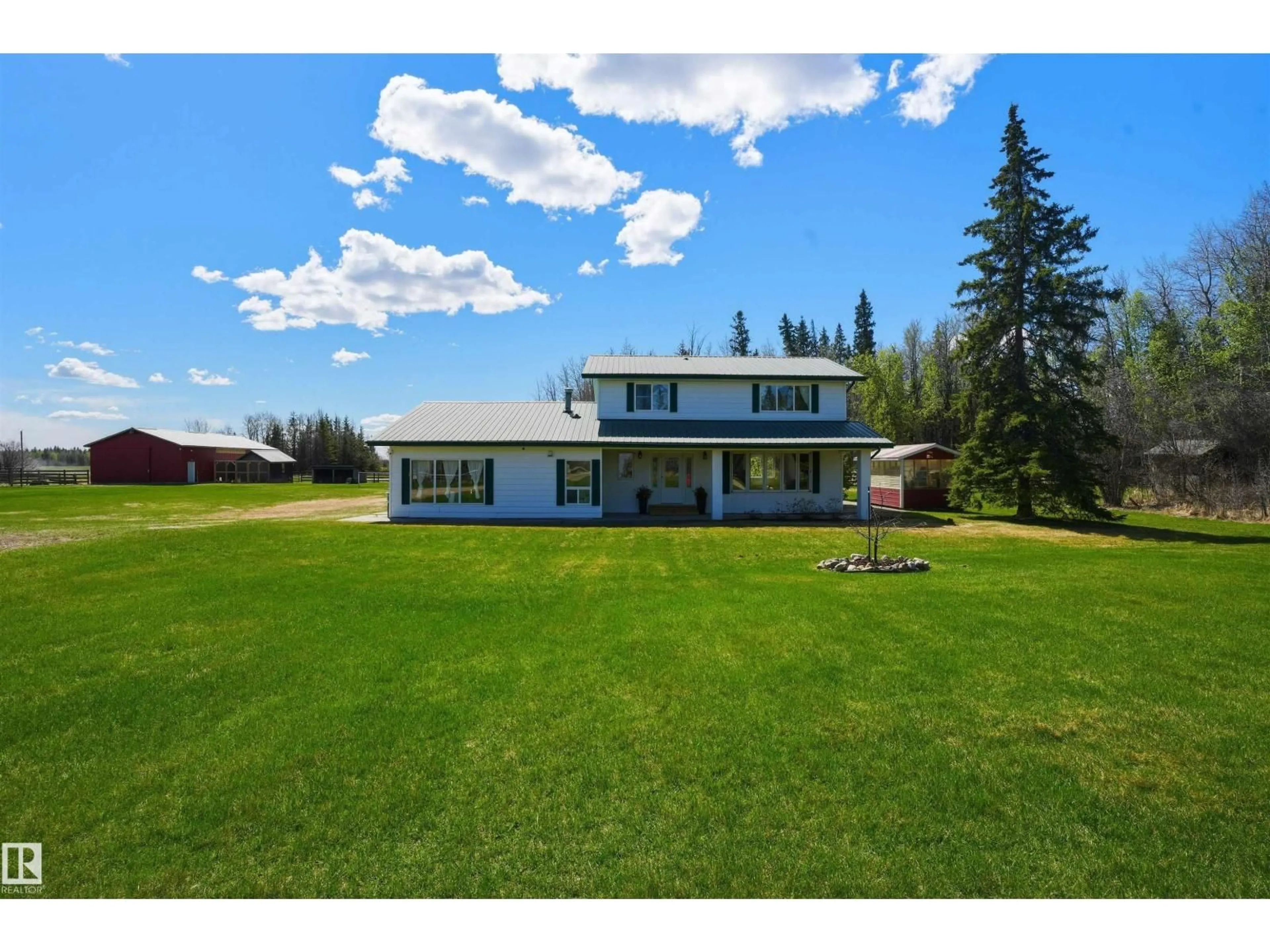 A pic from outside/outdoor area/front of a property/back of a property/a pic from drone, unknown for 3003 TWP ROAD 562, Rural Lac Ste. Anne County Alberta T0E1V0