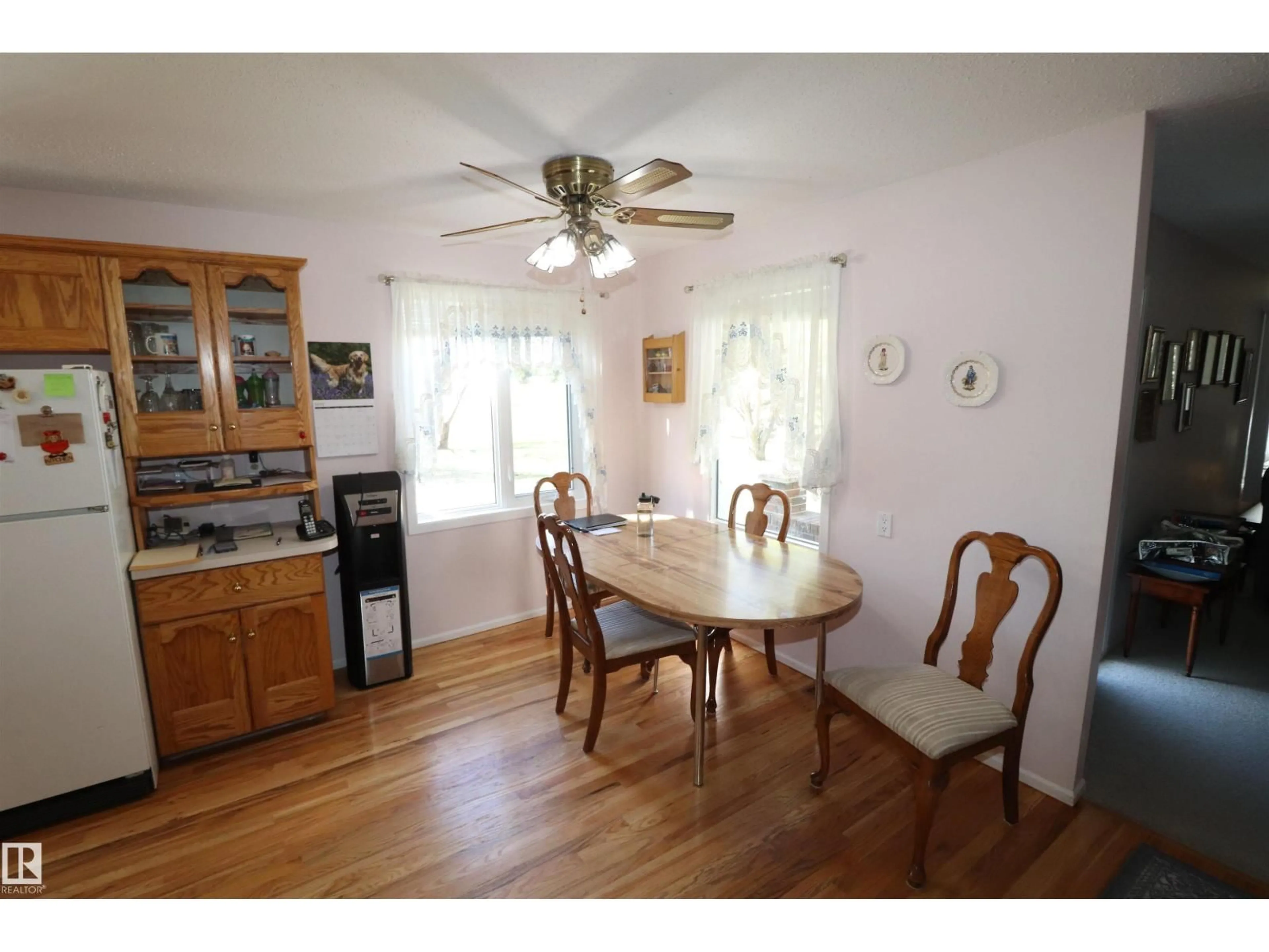 Dining room, wood/laminate floor for 22348 TWP ROAD 512, Rural Strathcona County Alberta T8C1H2