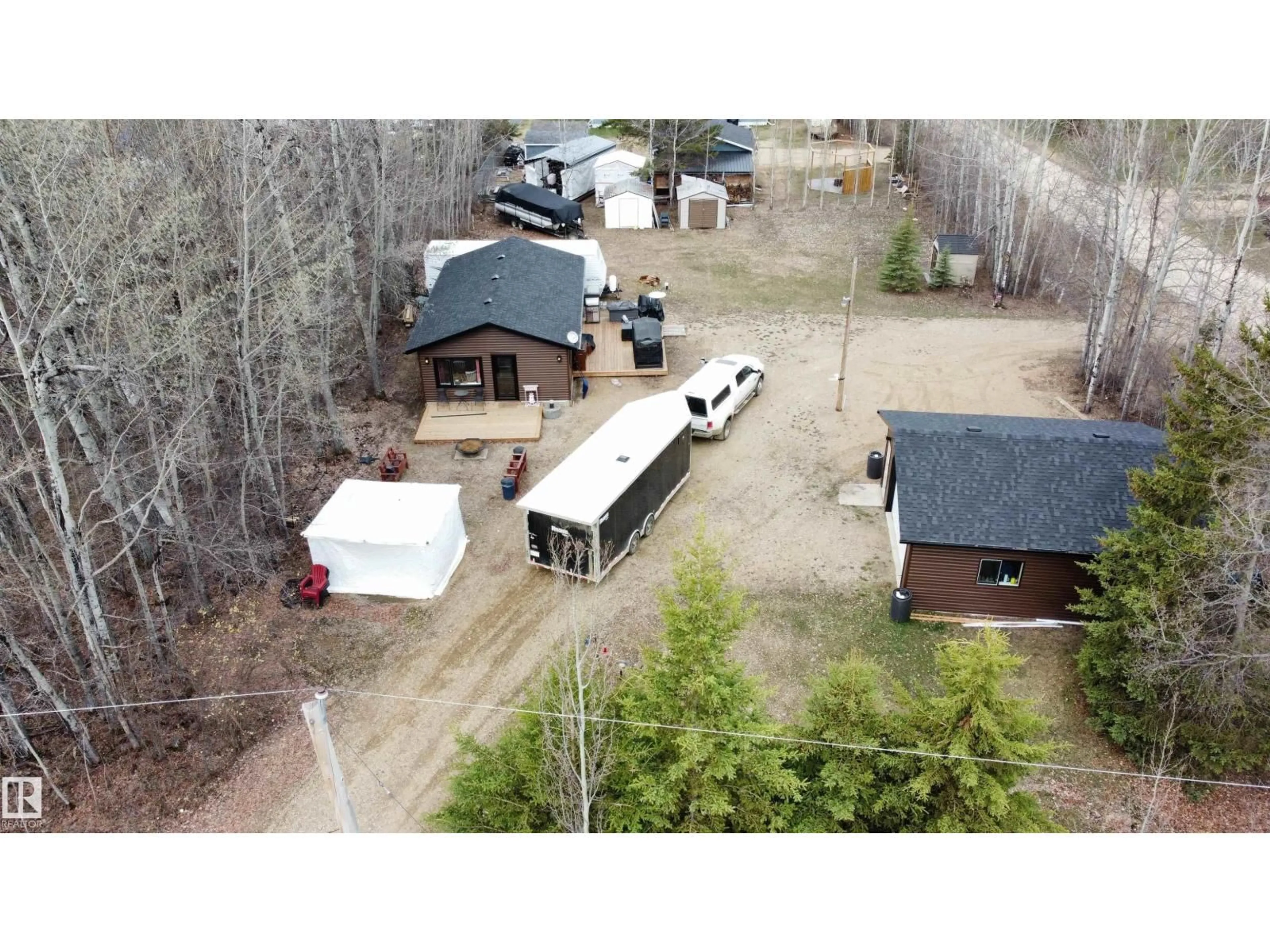A pic from outside/outdoor area/front of a property/back of a property/a pic from drone, street for 662066 - 156 RGE RD 181, Rural Athabasca County Alberta T0A1V0