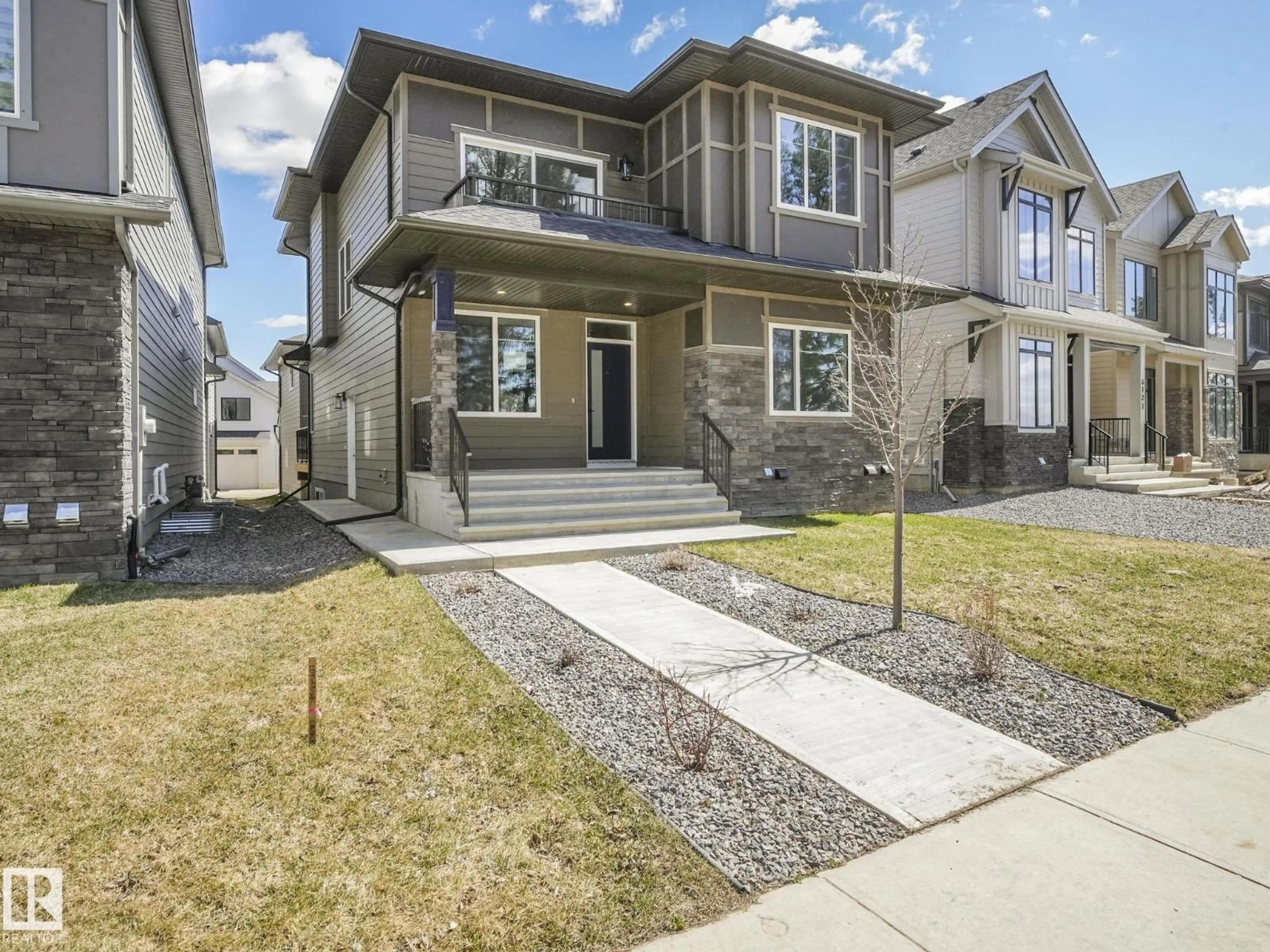 Home with vinyl exterior material, street for 6125 CRAWFORD DR, Edmonton Alberta T6W4L8