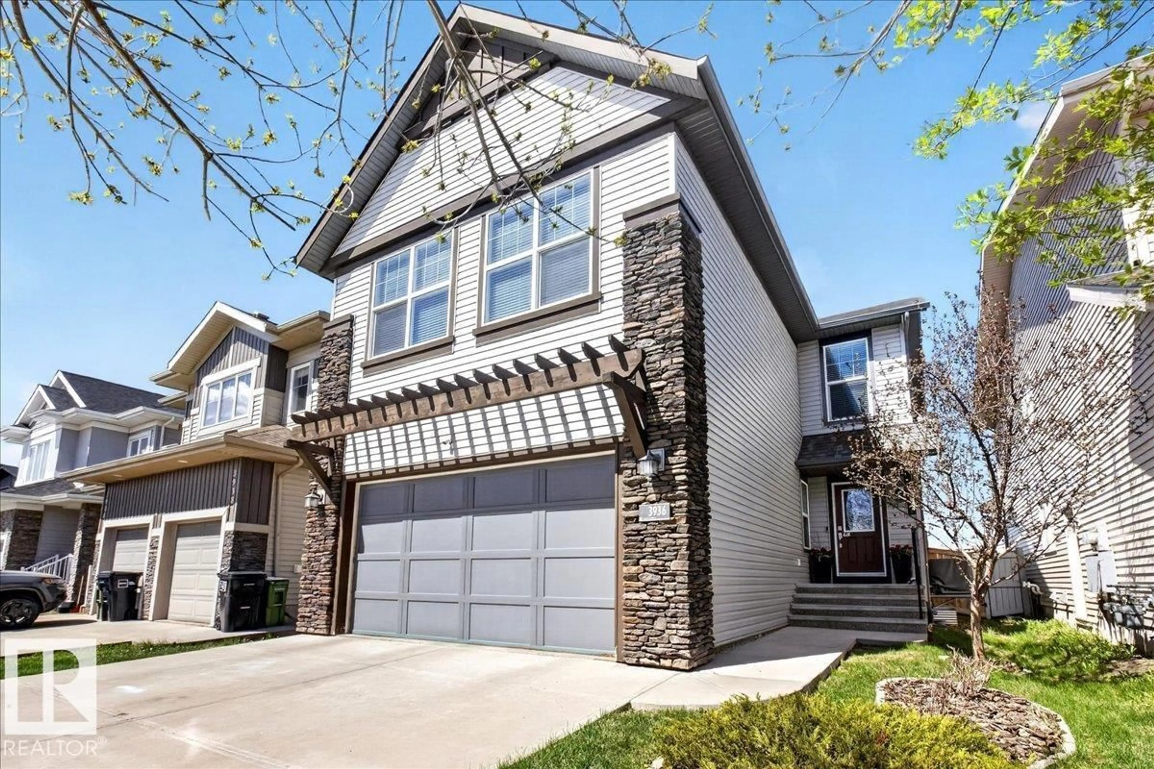 Home with vinyl exterior material, street for SW - 3936 CLAXTON LO, Edmonton Alberta T6W1Y6