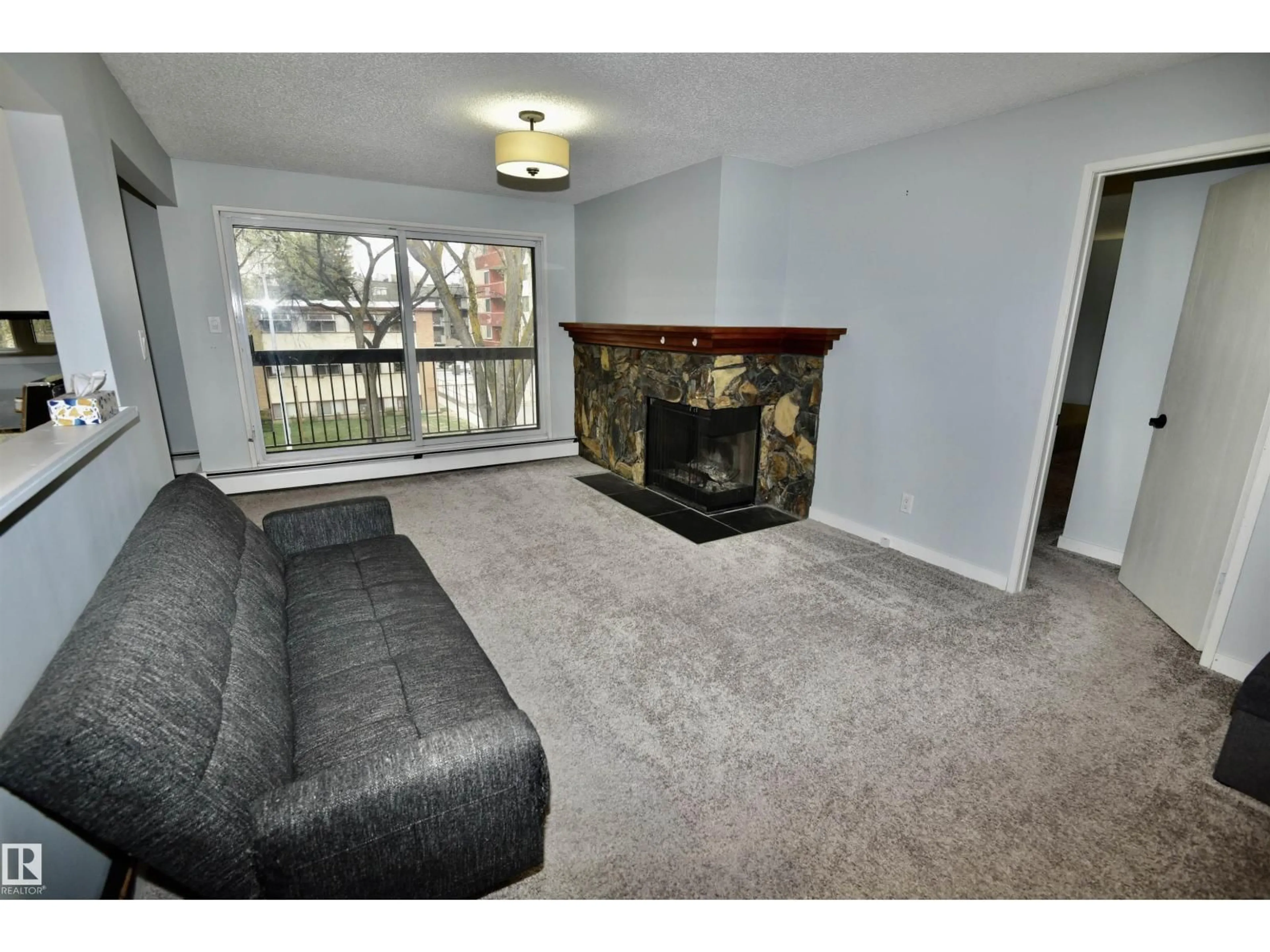 Living room with furniture, unknown for #21 - 10160 119 ST, Edmonton Alberta T5K1Y9