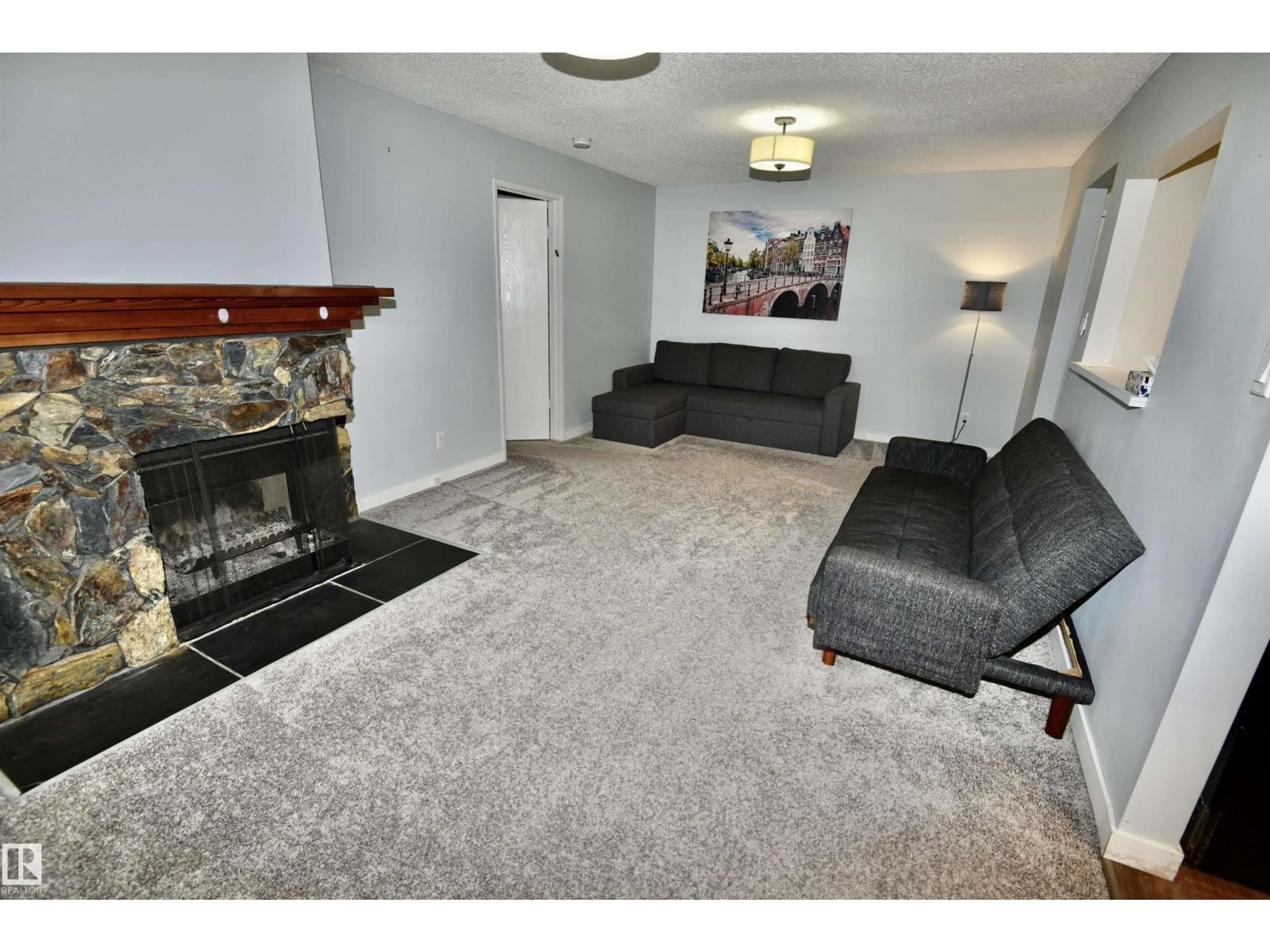 Living room with furniture, carpet floor for #21 - 10160 119 ST, Edmonton Alberta T5K1Y9