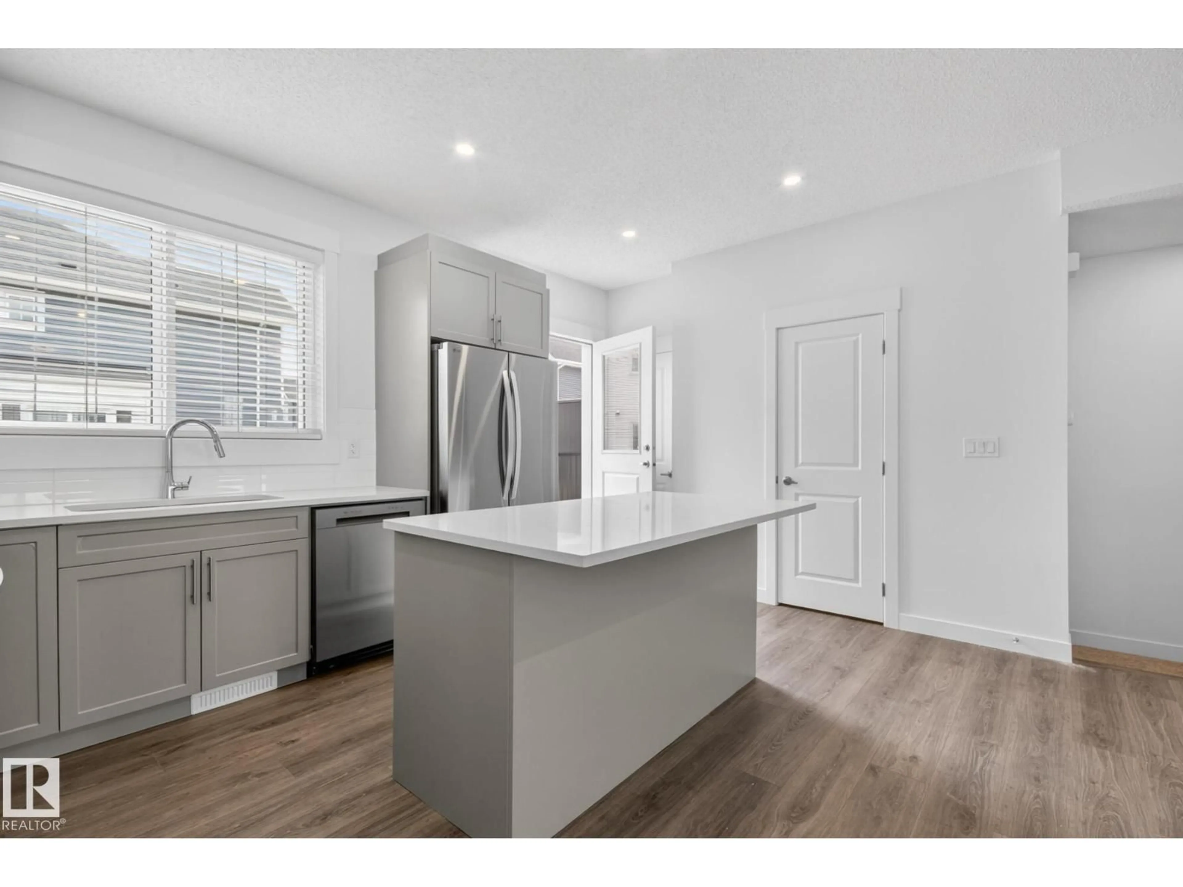 Open concept kitchen, unknown for 3605 JAMES MOWATT TR, Edmonton Alberta T6W1A8