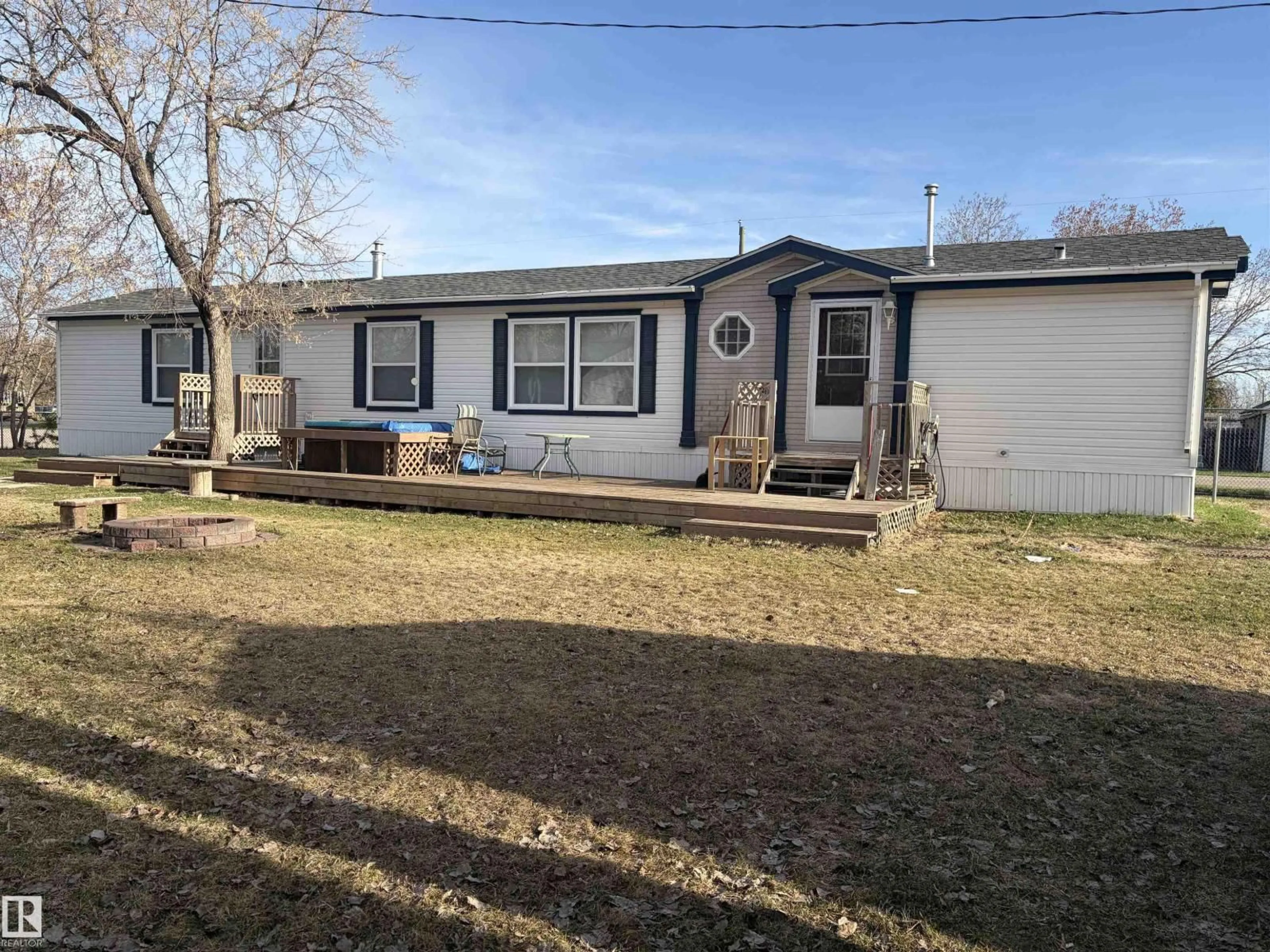 Home with vinyl exterior material, street for 4911 49 STREET, Ardmore Alberta T0A0B0