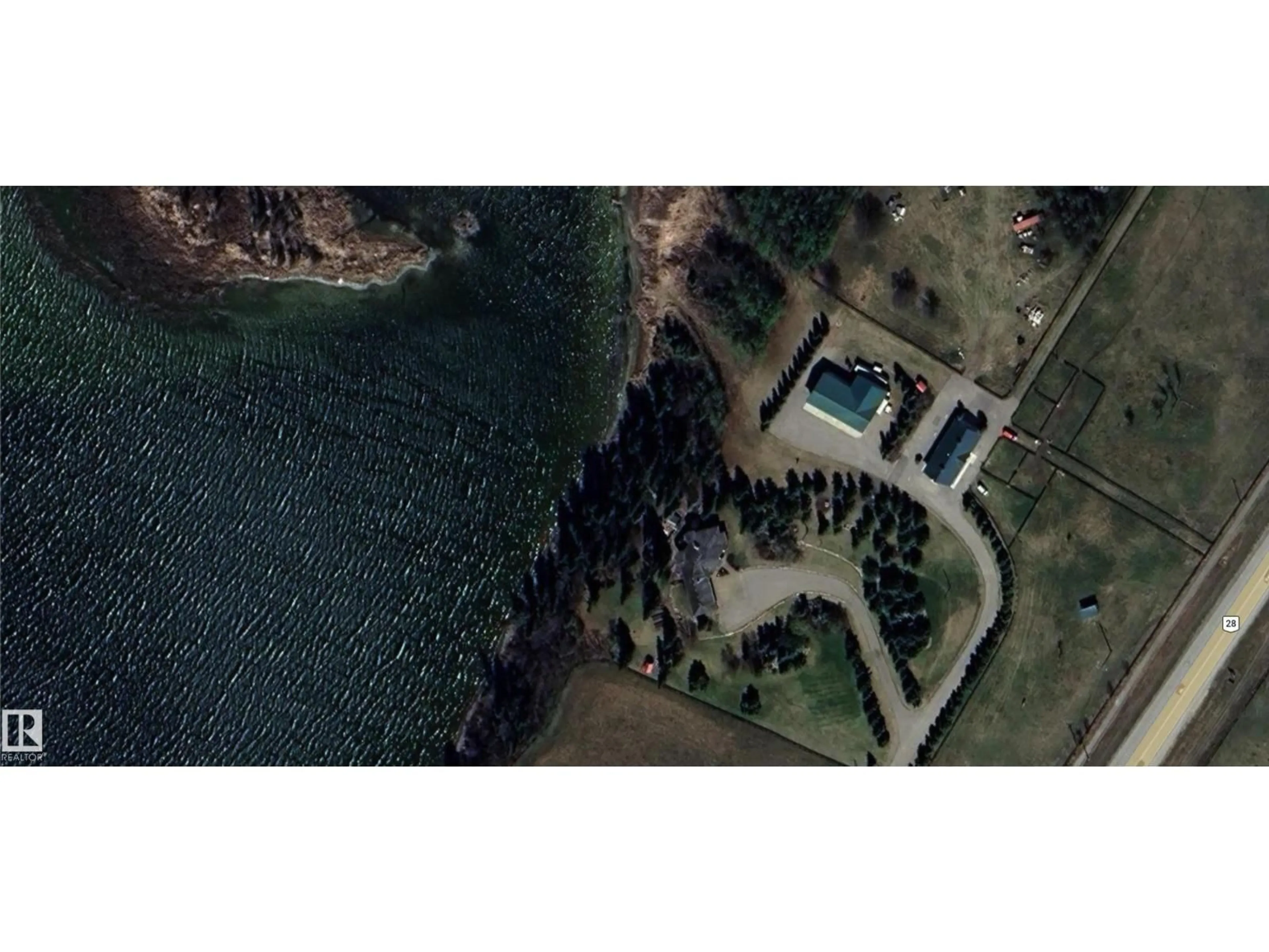 A pic from outside/outdoor area/front of a property/back of a property/a pic from drone, water/lake/river/ocean view for 61118 HIGHWAY 28, Rural Bonnyville M.D. Alberta T9N2J6