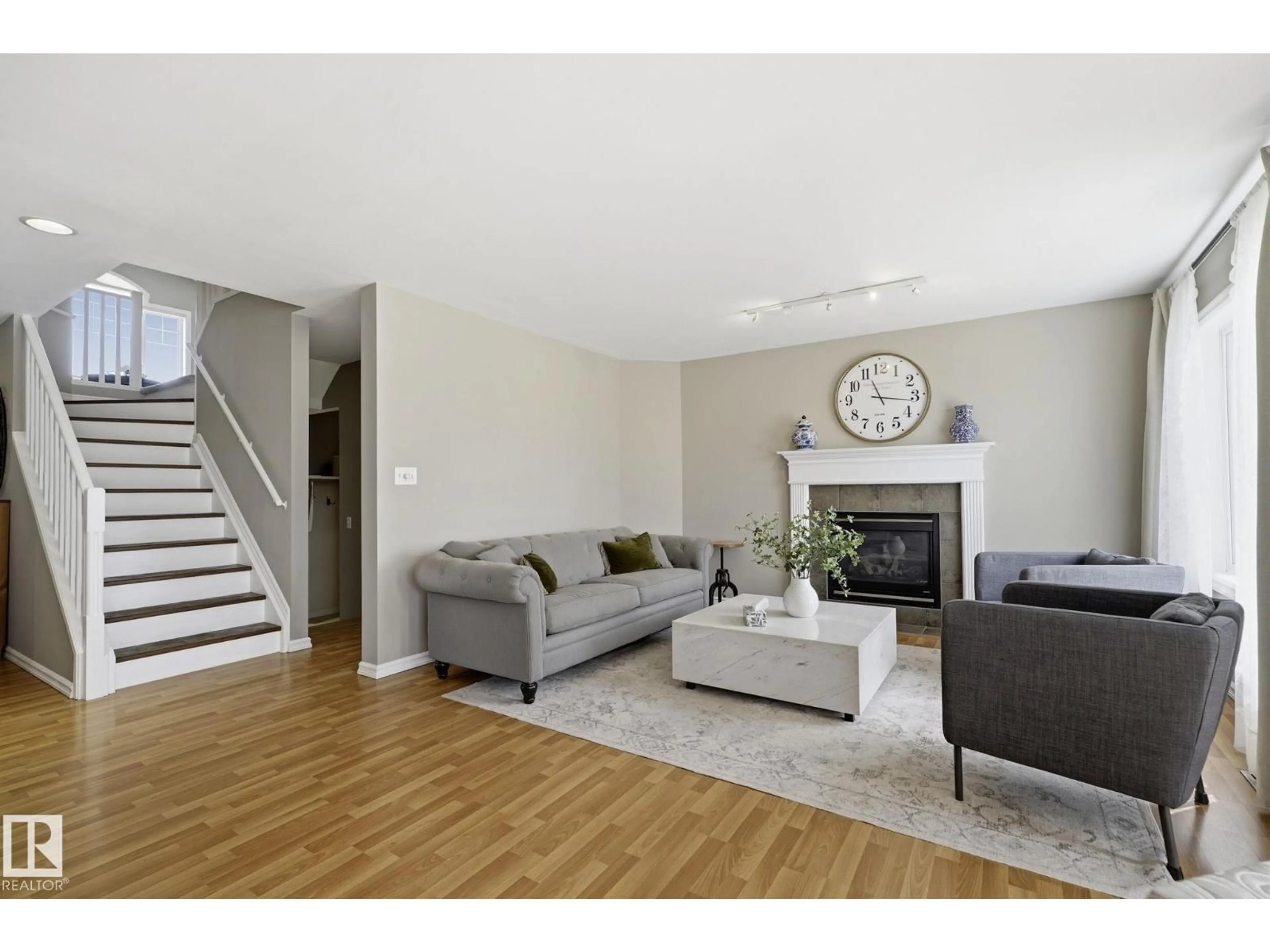 Living room with furniture, unknown for 3327 32 AV, Edmonton Alberta T6T1X7