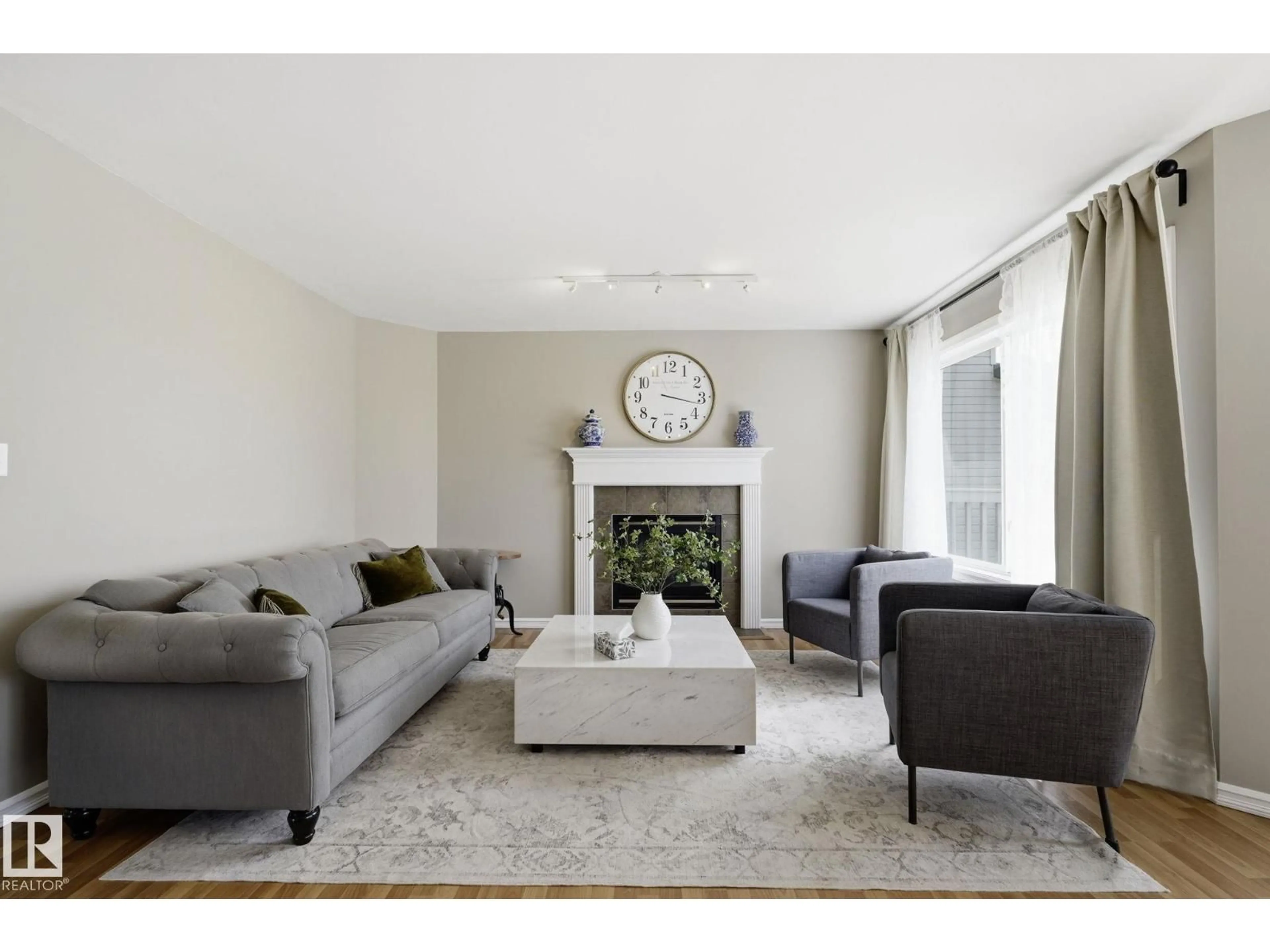 Living room with furniture, unknown for 3327 32 AV, Edmonton Alberta T6T1X7