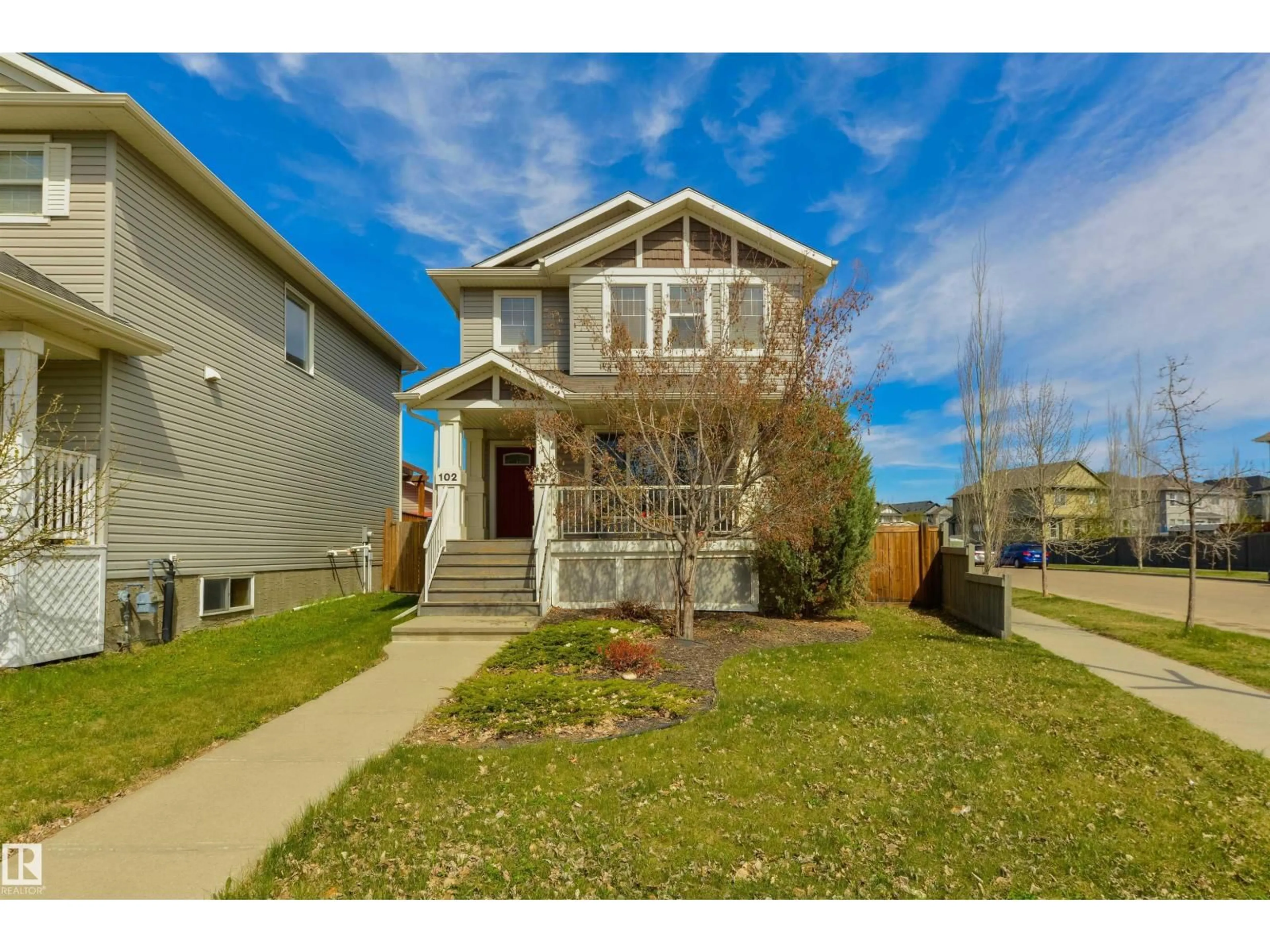 Home with vinyl exterior material, street for 102 KIRPATRICK BN, Leduc Alberta T9E0W3