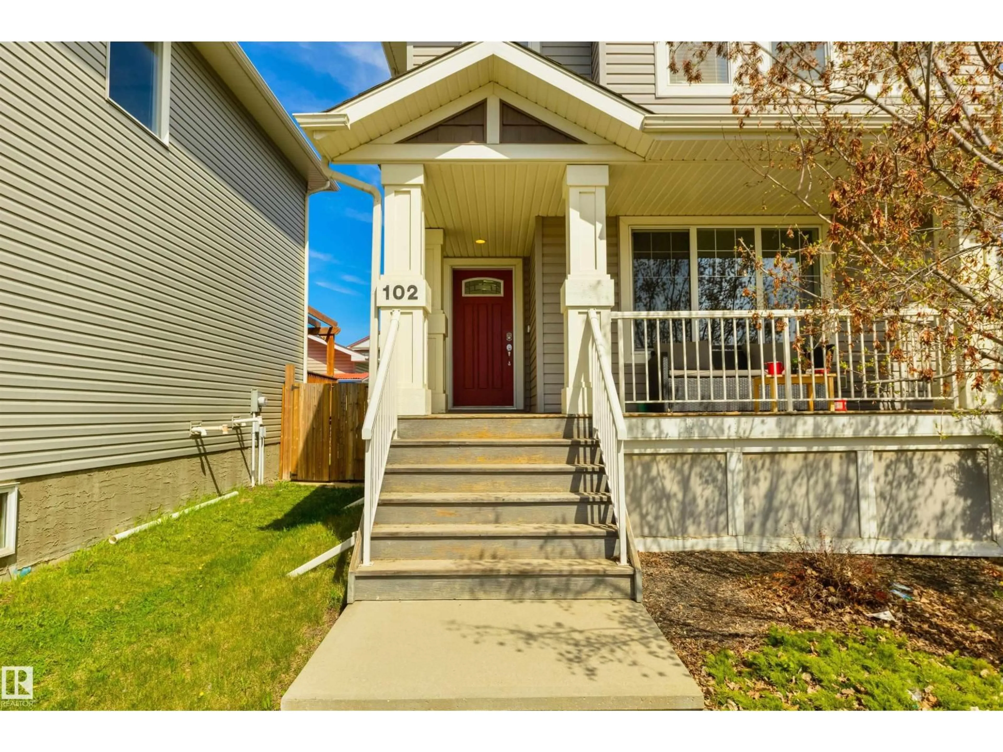 Home with vinyl exterior material, street for 102 KIRPATRICK BN, Leduc Alberta T9E0W3
