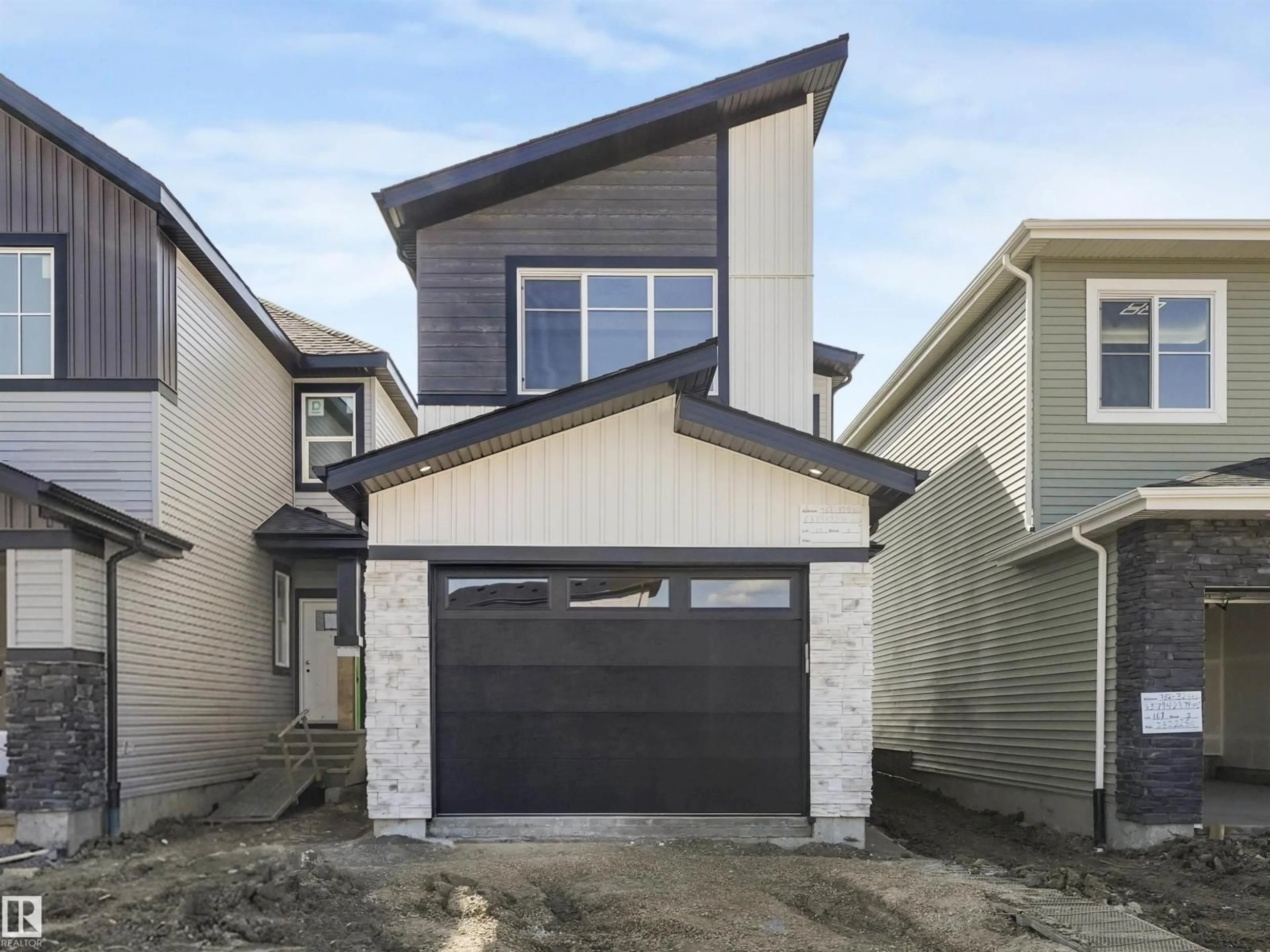 Home with vinyl exterior material, street for SW - 756 32 ST, Edmonton Alberta T6X3M5