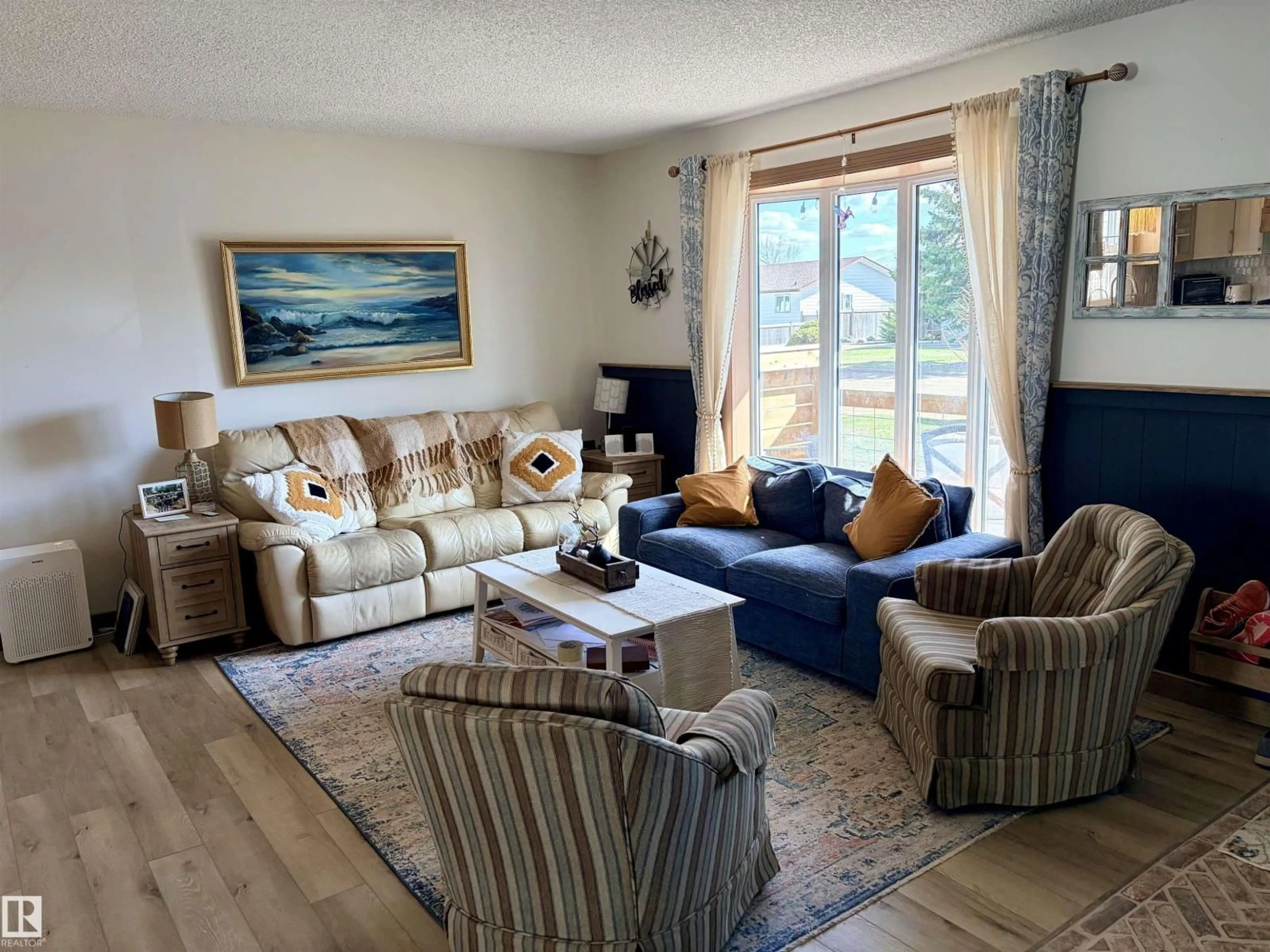 Living room with furniture, unknown for 5132 54 AV, Mundare Alberta T0B3H0
