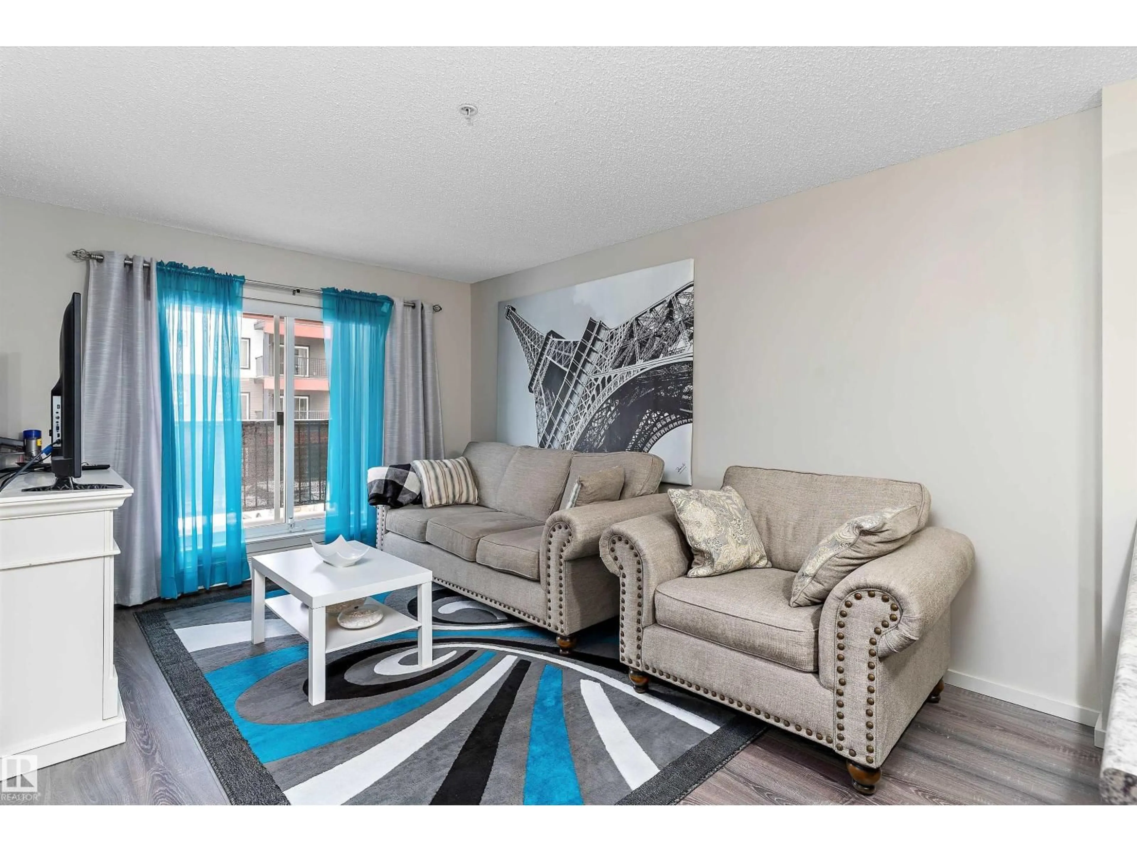 Living room with furniture, unknown for #221 - 344 WINDERMERE RD, Edmonton Alberta T6W2P2