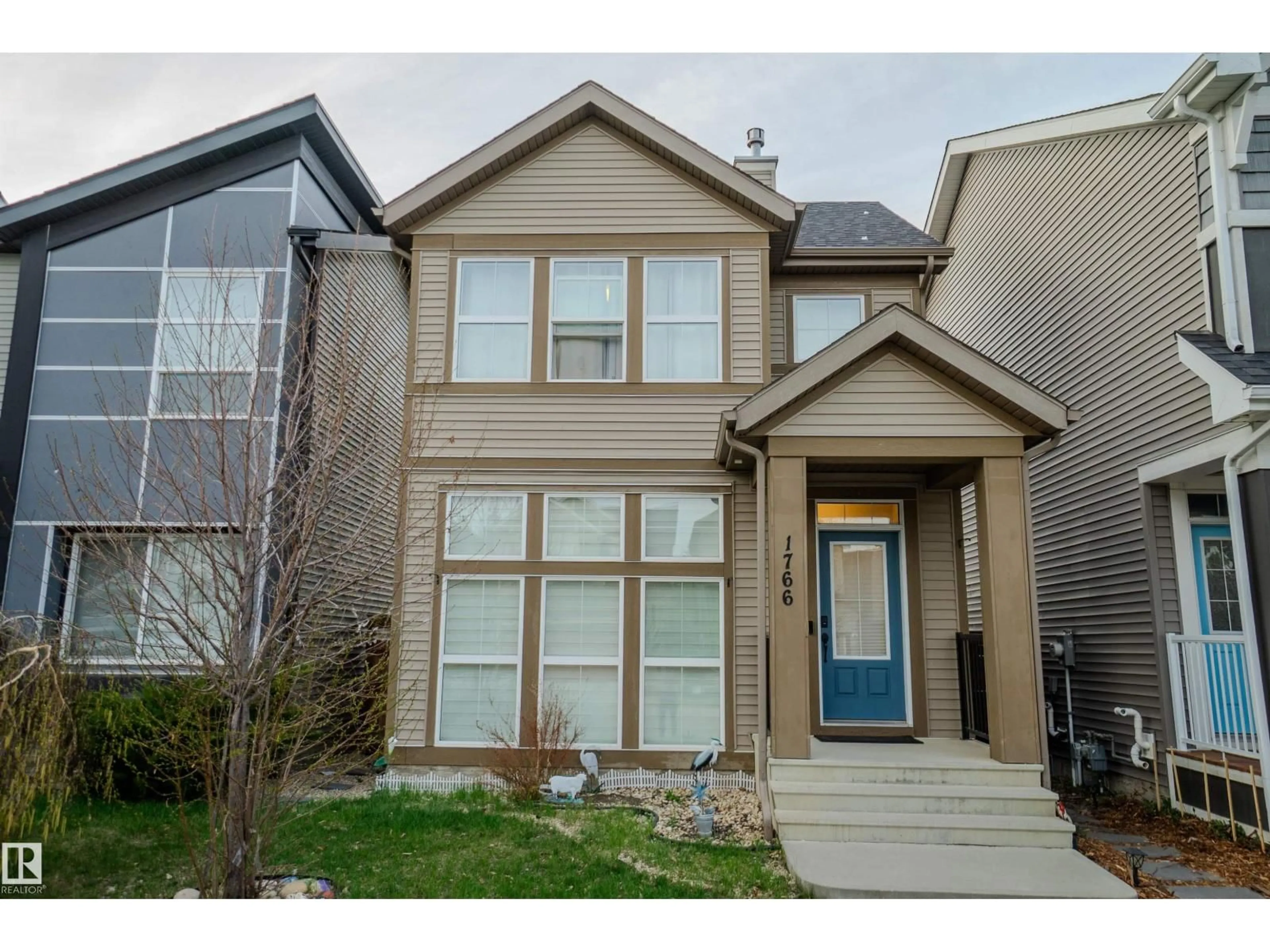 Home with vinyl exterior material, street for 1766 DUMONT CR, Edmonton Alberta T6W3V8