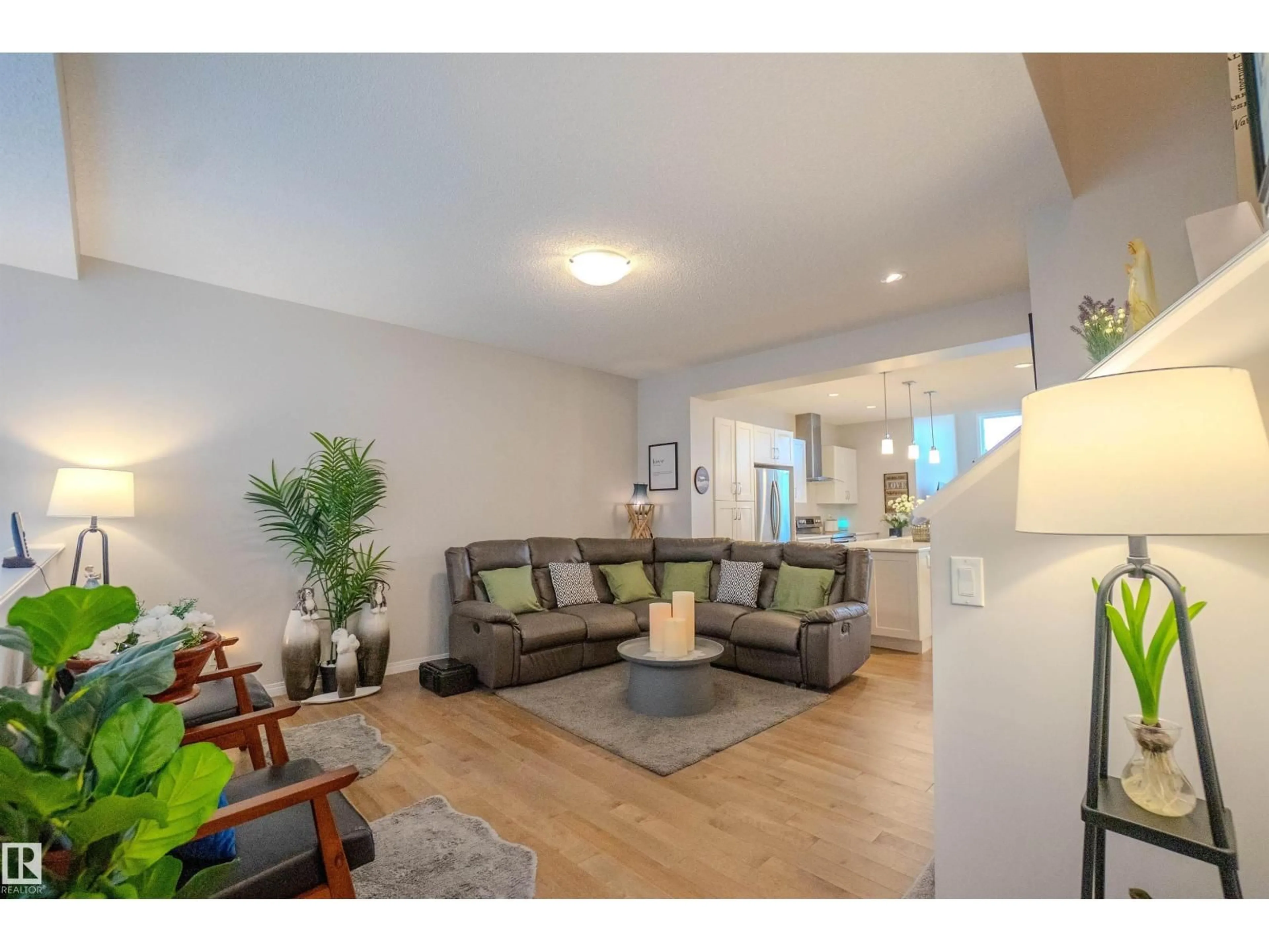 Living room with furniture, wood/laminate floor for 1766 DUMONT CR, Edmonton Alberta T6W3V8