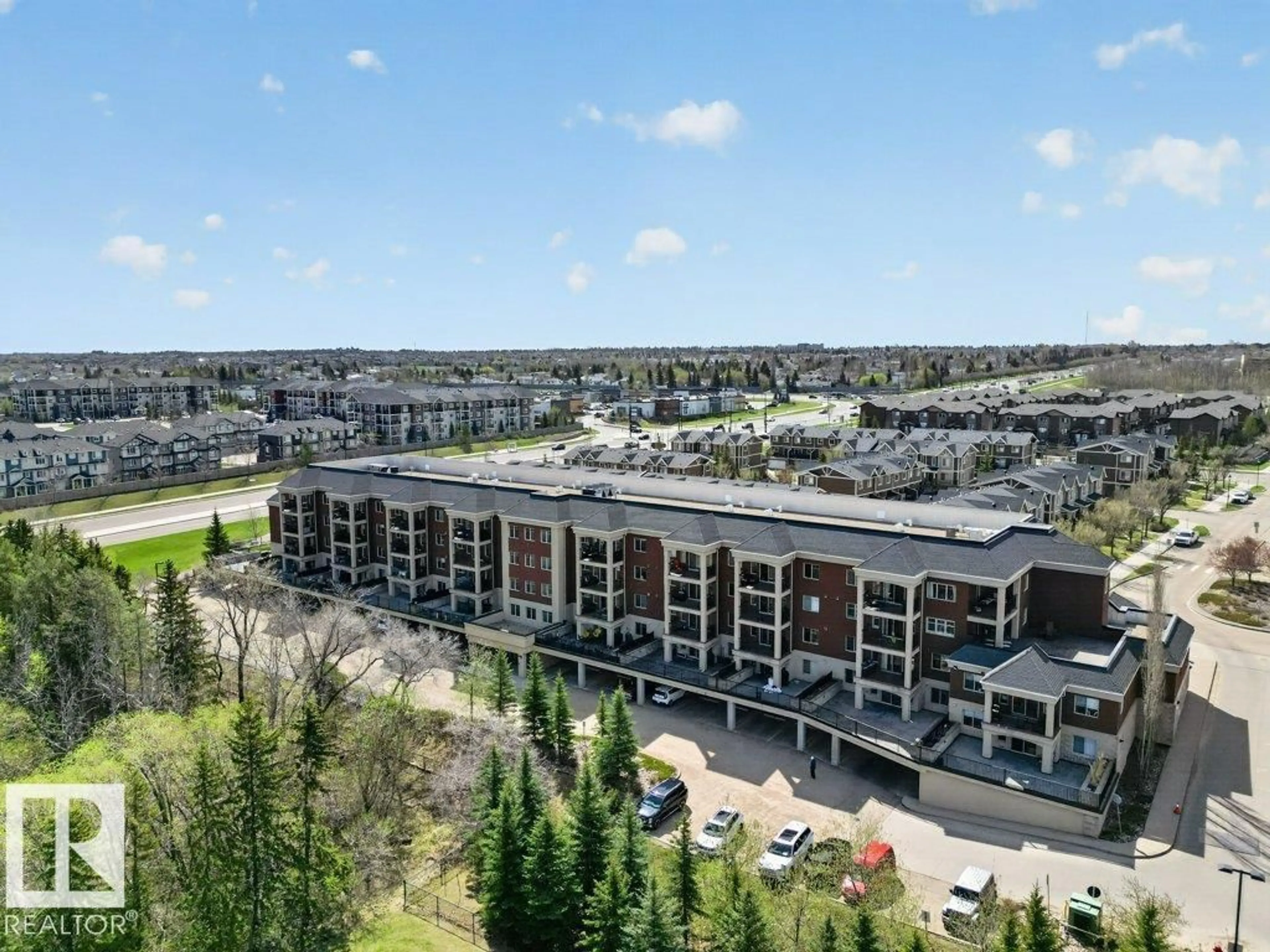 A pic from outside/outdoor area/front of a property/back of a property/a pic from drone, mountain view for 207 - 501 PALISADES WY, Sherwood Park Alberta T8H0H8