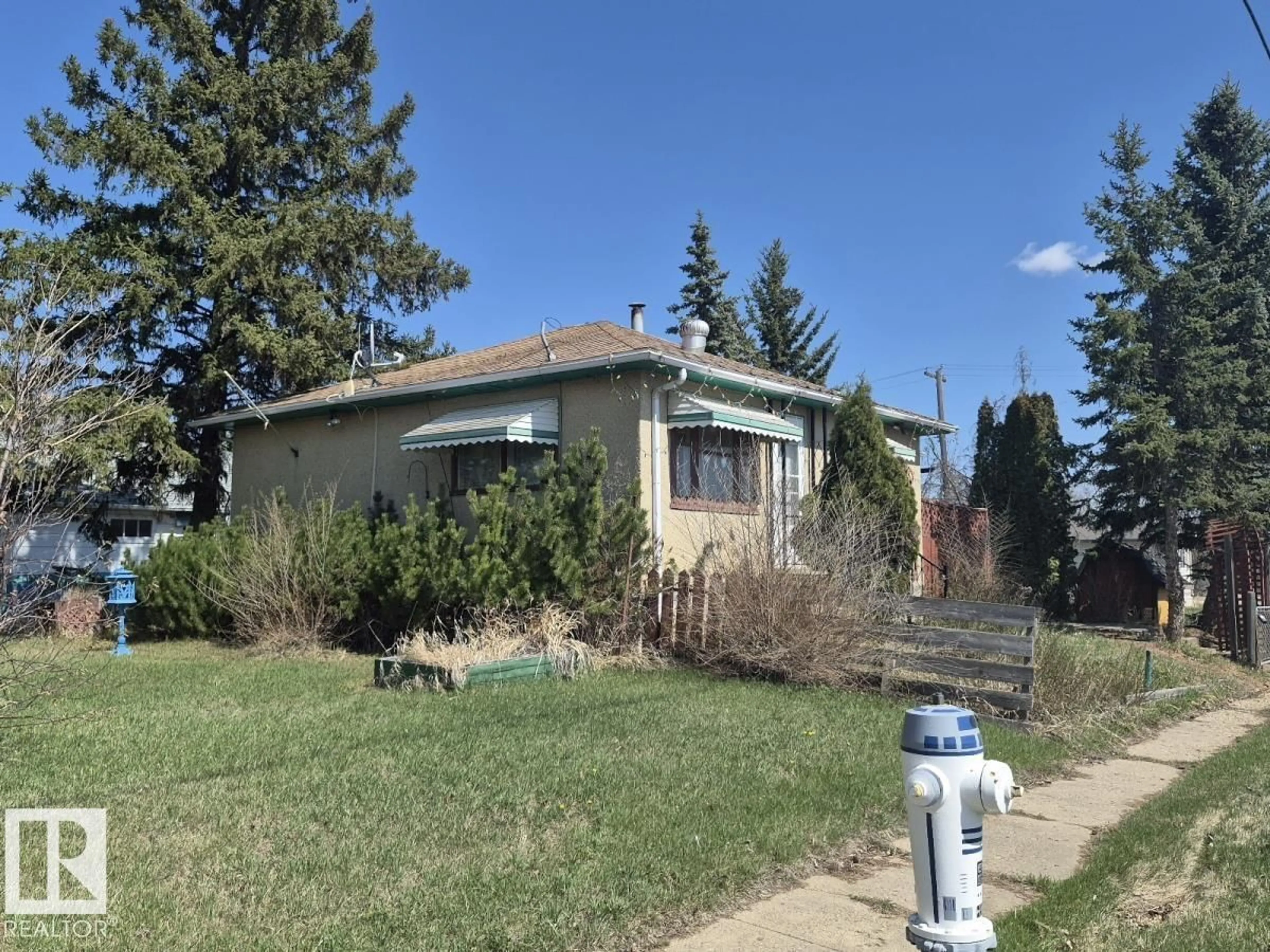 Home with vinyl exterior material, street for 5003 49 ST, Ryley Alberta T0B4A0